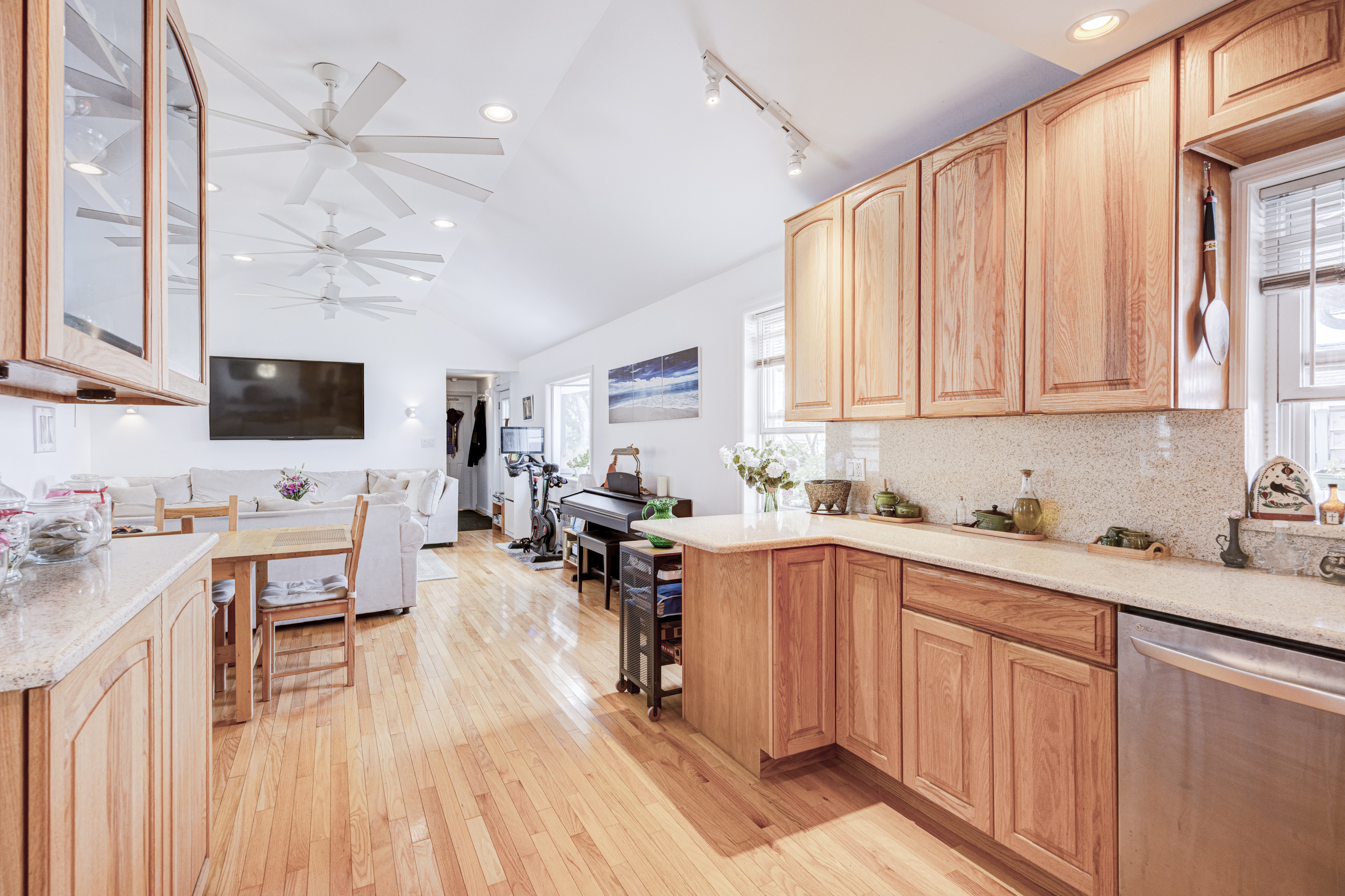 355 D Dormans Court Queens, NY 11693 - Photo 7 of 21 a kitchen with a sink a stove cabinets and wooden floor
