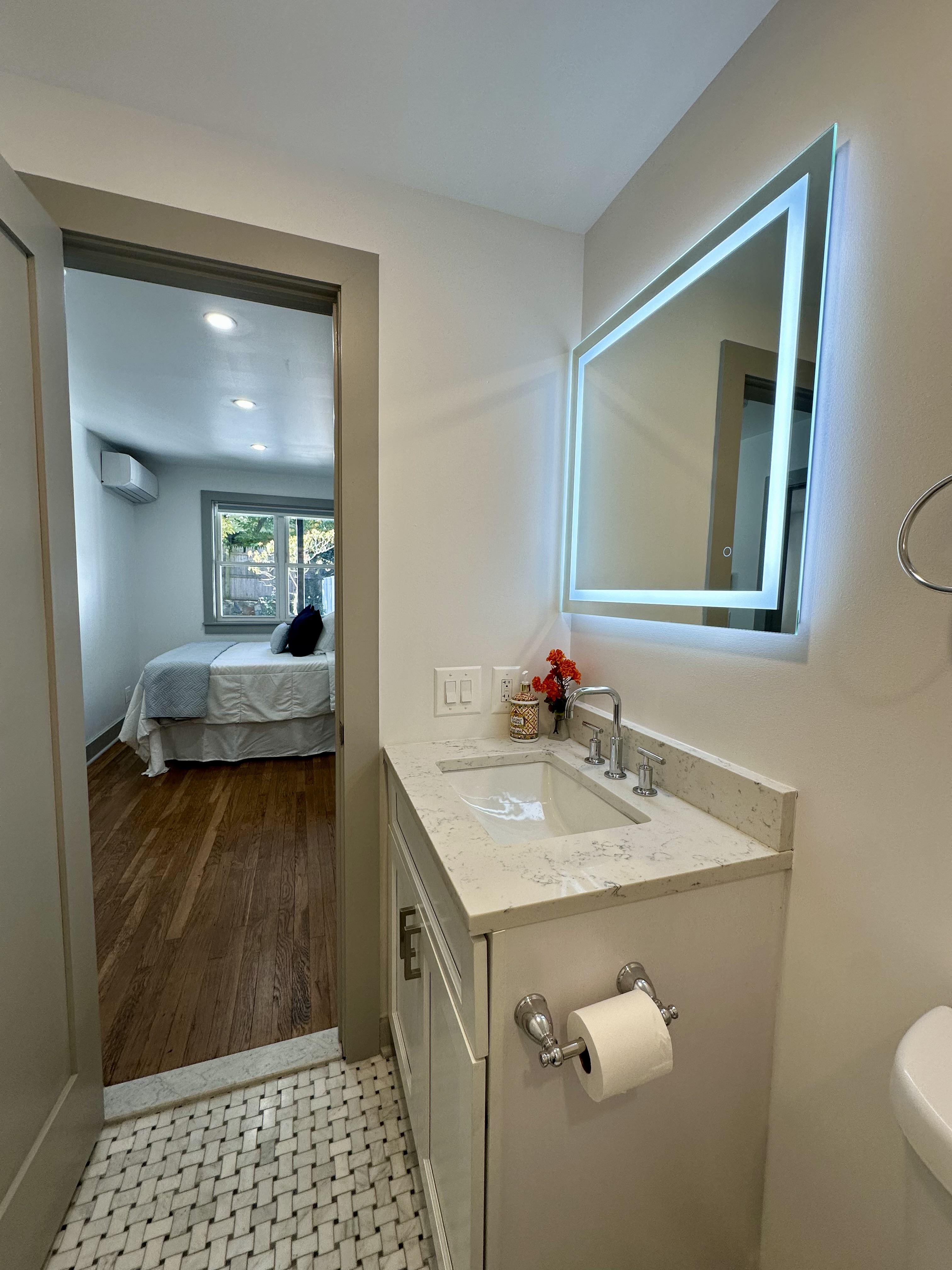 5823 Fieldston Road, Unit 1A Bronx, NY 10471 - Photo 19 of 26 a bathroom with a sink and a mirror