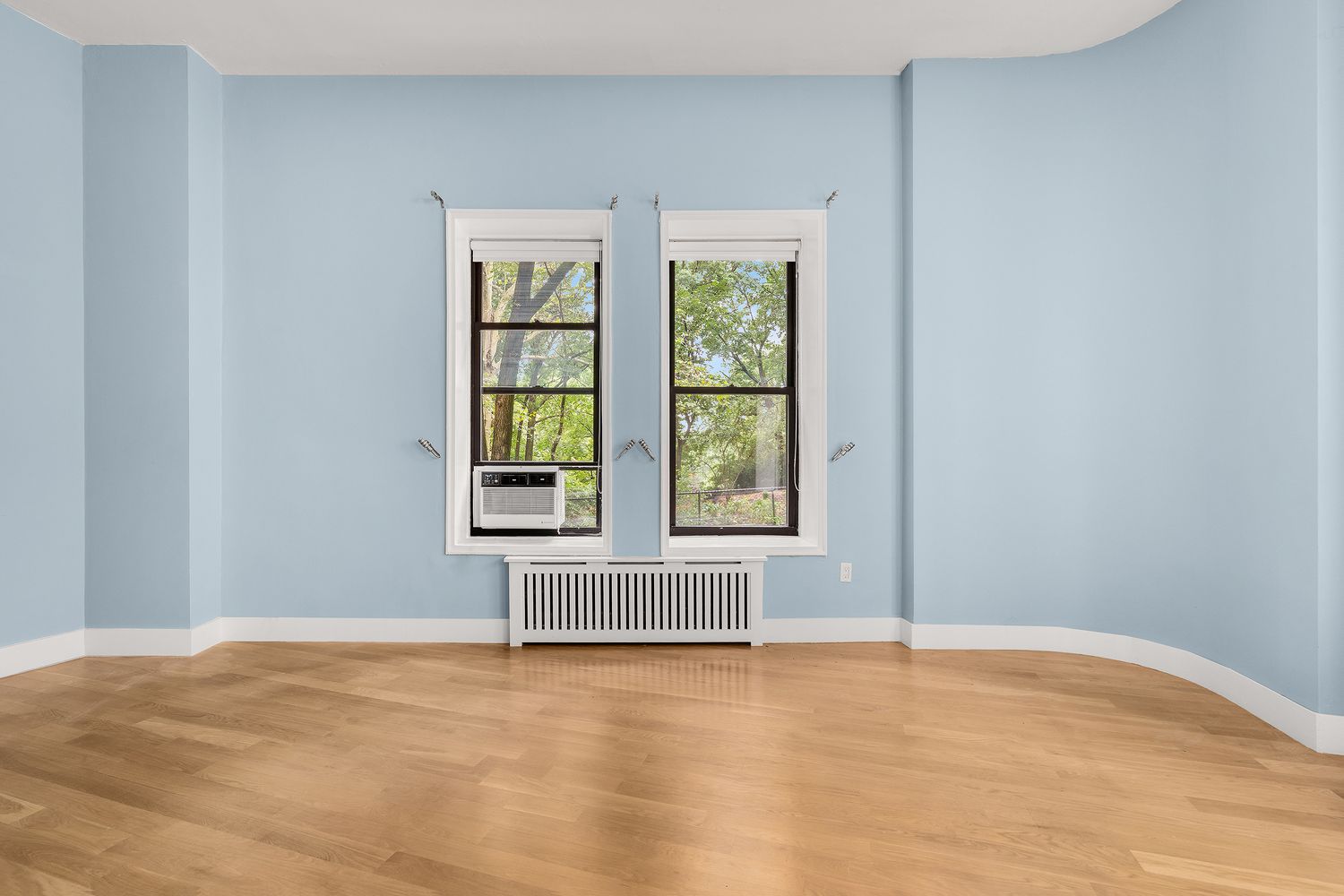 265 Riverside Drive, Unit 1C Manhattan, NY 10025 - Photo 4 of 10 a view of an empty room with a window