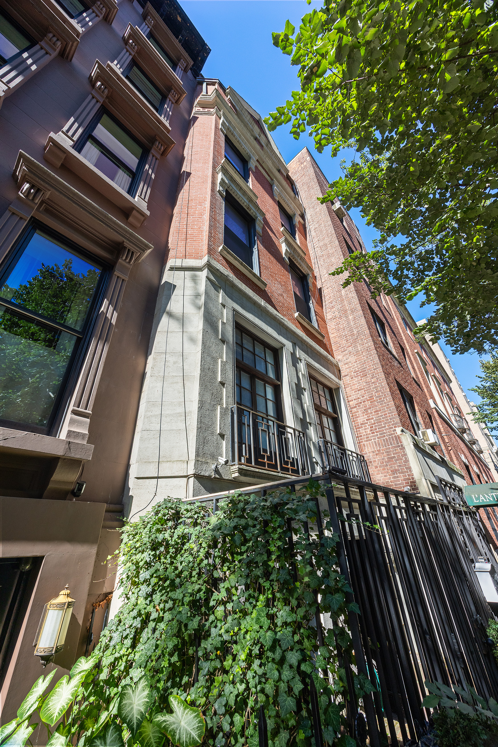 38 East 73rd Street Manhattan, NY 10021 - Photo 22 of 25 front view of a house