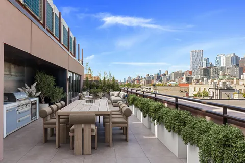 a view of a terrace with sitting area