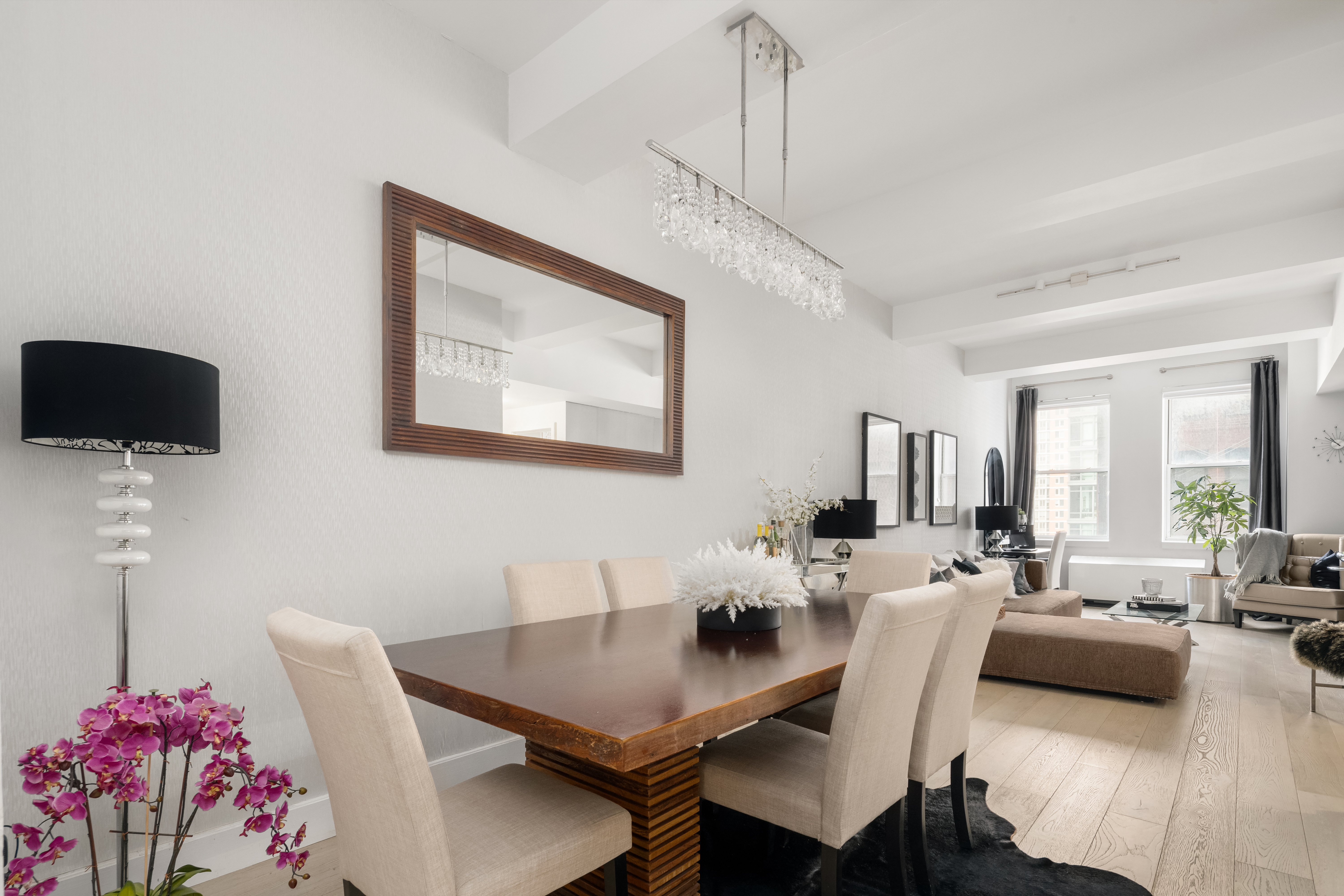 80 Chambers Street, Unit 12C Manhattan, NY 10007 - Photo 4 of 15 a view of a dining room with furniture