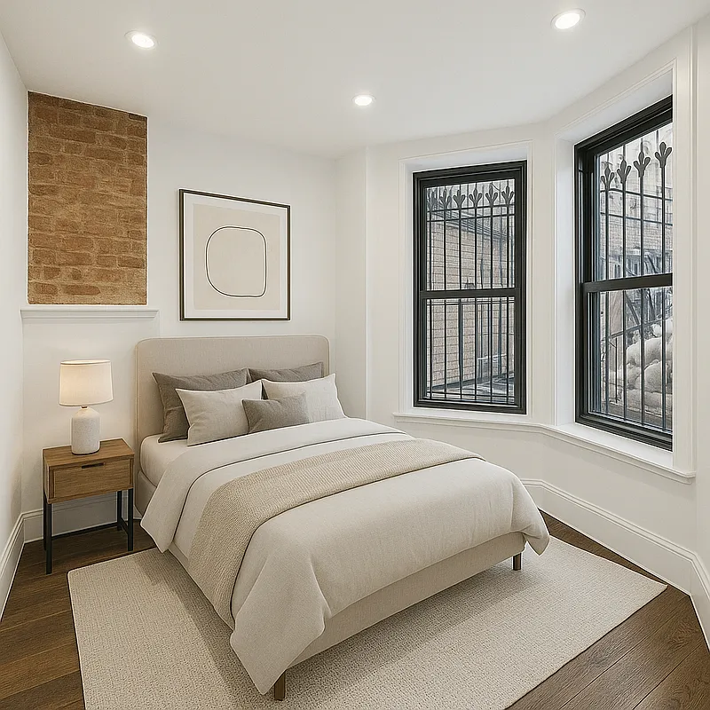 1316 Jefferson Avenue, Unit GDN Brooklyn, NY 11221 - Photo 4 of 6 a bedroom with a bed and a large window
