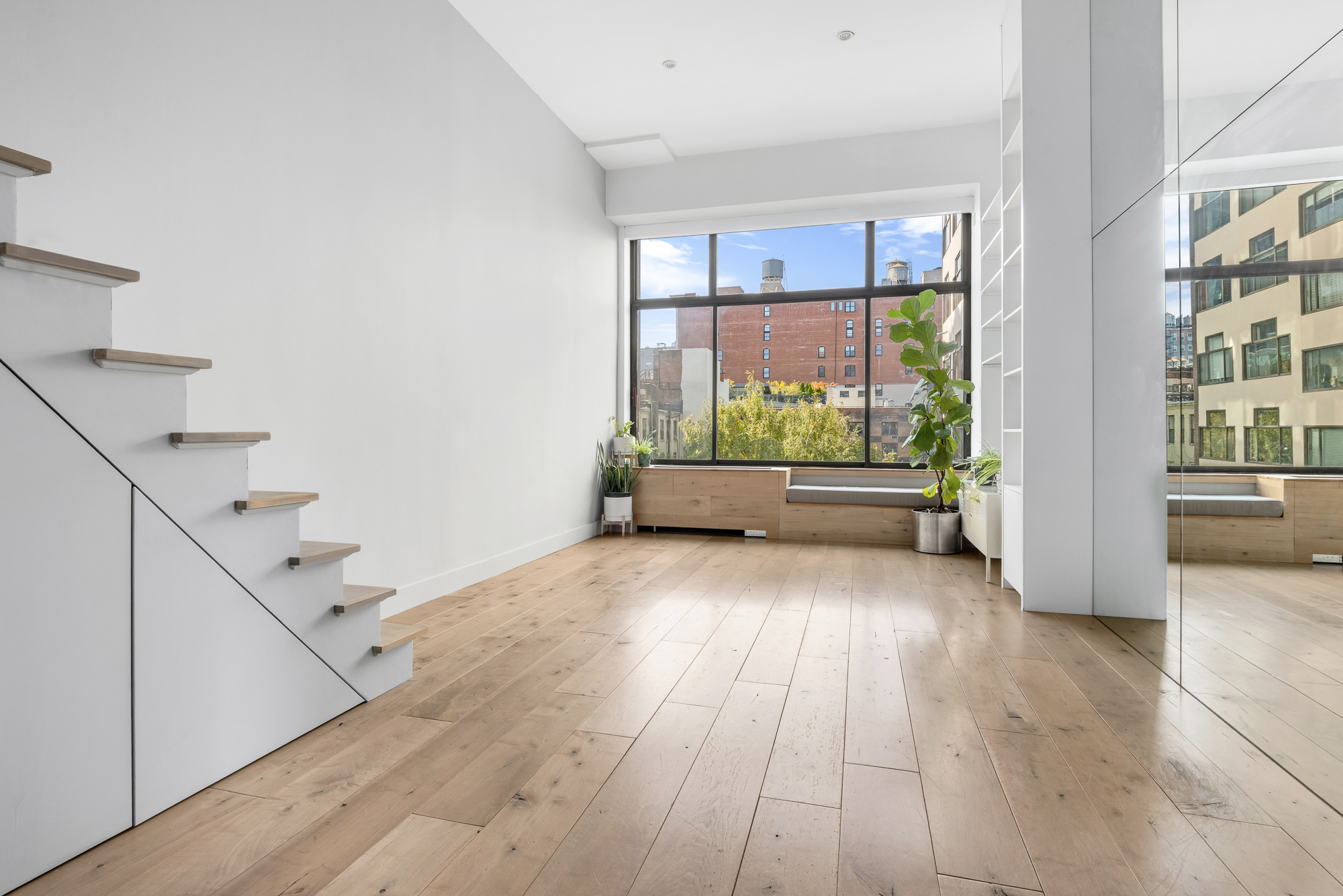 77 Bleecker Street, Unit 617 Manhattan, NY 10012 - Photo 2 of 13 a view of an empty room with a window