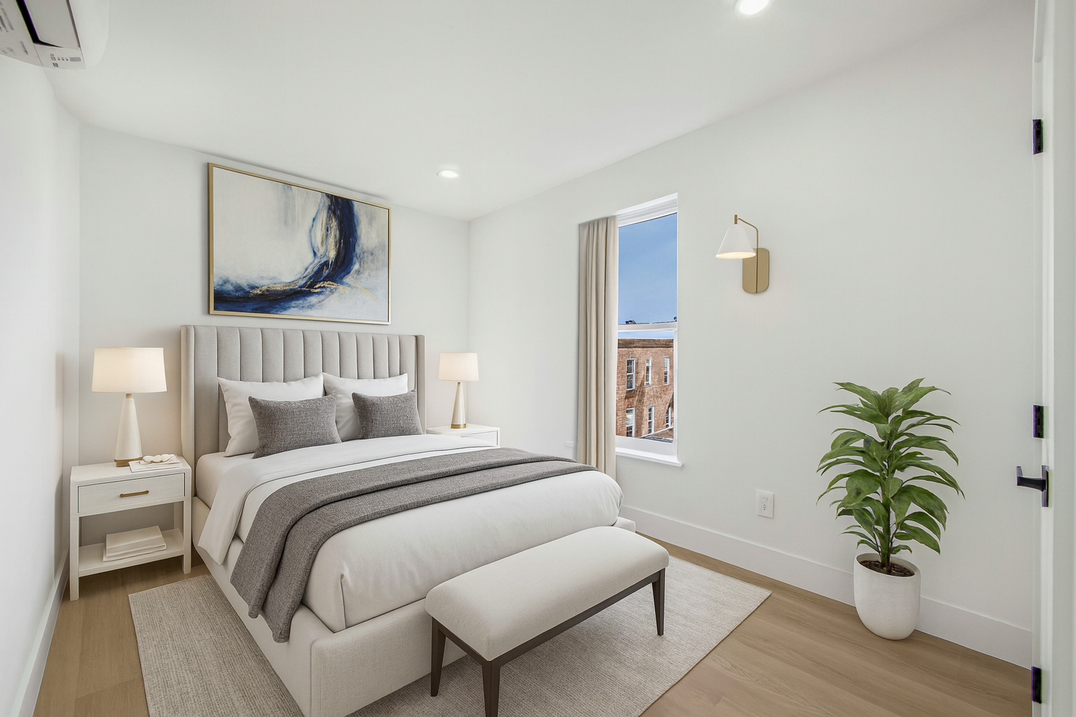 433 Court Street, Unit PH3 Brooklyn, NY 11231 - Photo 11 of 14 a bedroom with a bed and a potted plant