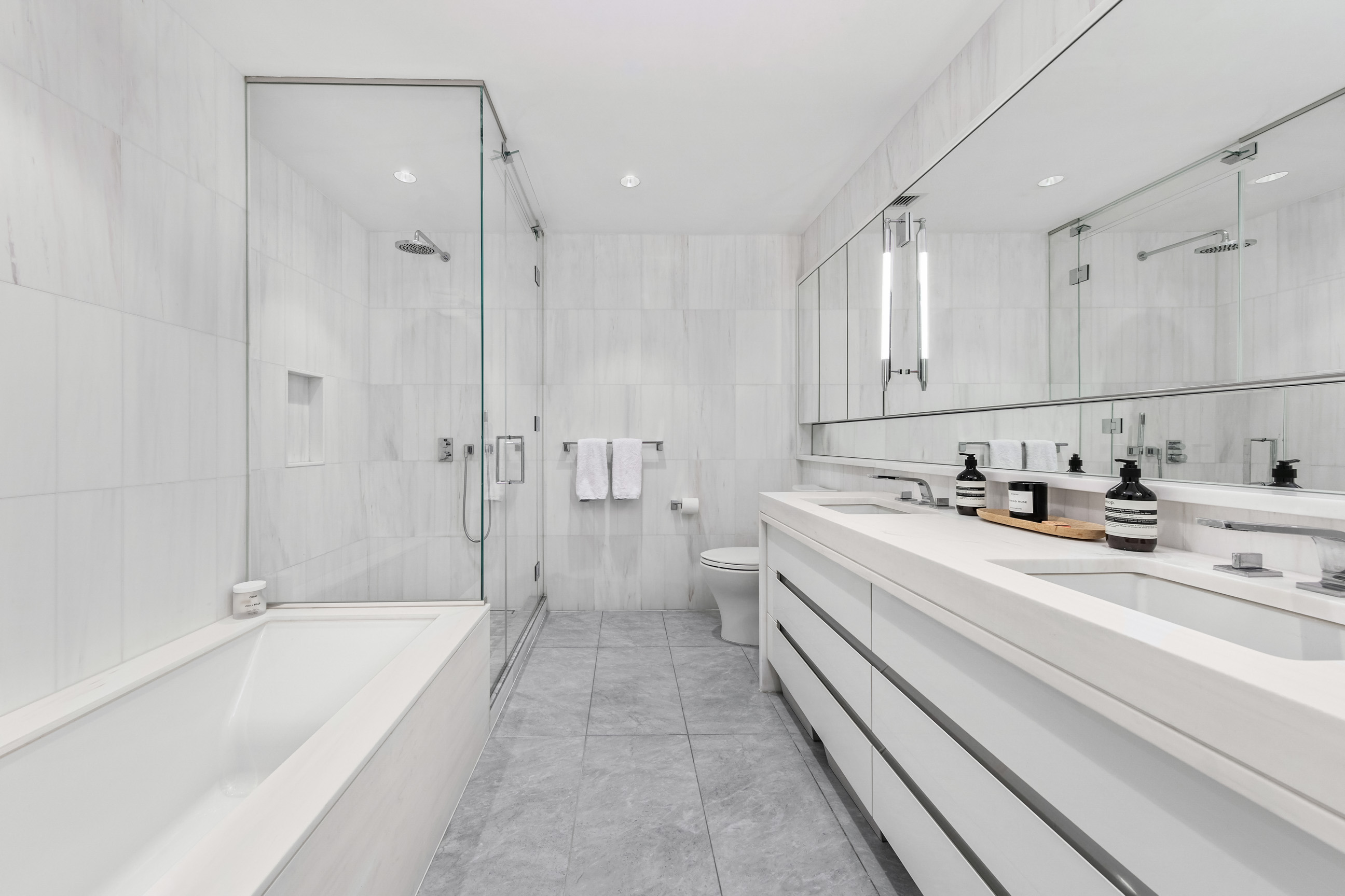 212 West 95th Street, Unit 4B Manhattan, NY 10025 - Photo 6 of 13 a bathroom with a bathtub and a sink