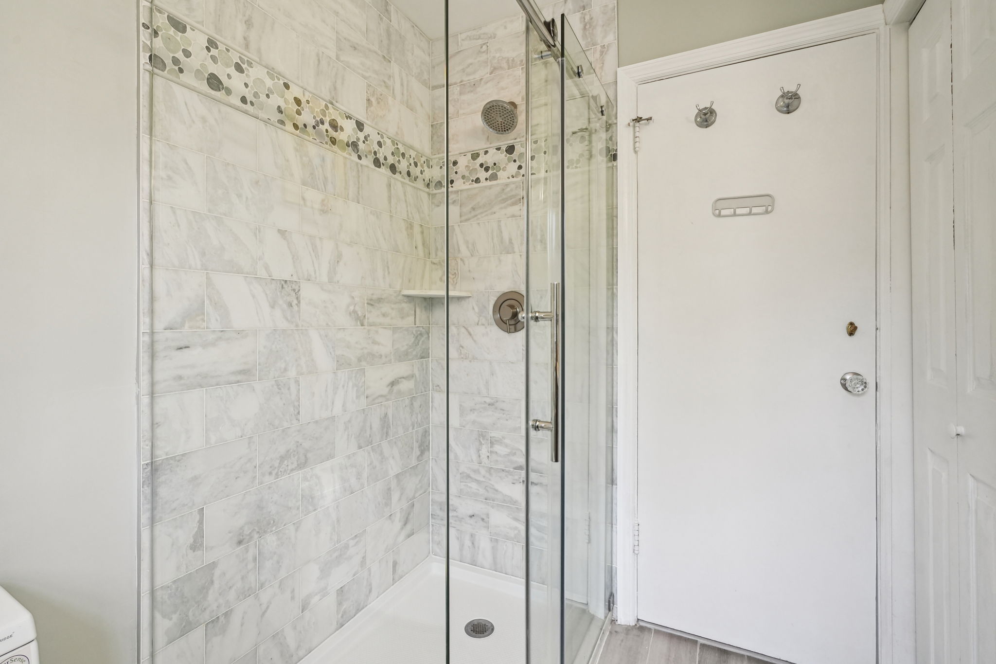 877 Ridgewood Road Millburn, NJ 07041 - Photo 19 of 37 a bathroom with a shower