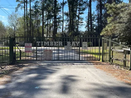 a view of a backyard with fence