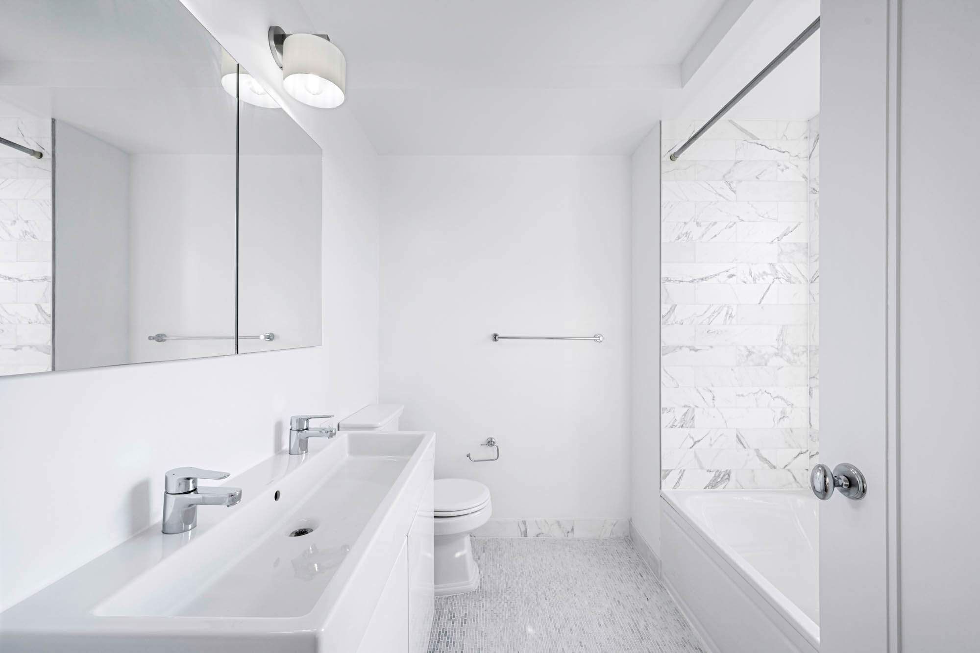 230 Riverside Drive, Unit 8D Manhattan, NY 10025 - Photo 9 of 19 a bathroom with a sink a toilet and shower