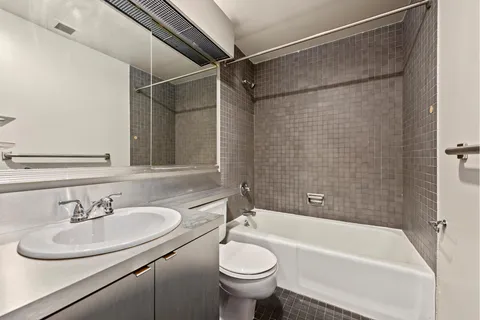 a bathroom with a sink and a toilet