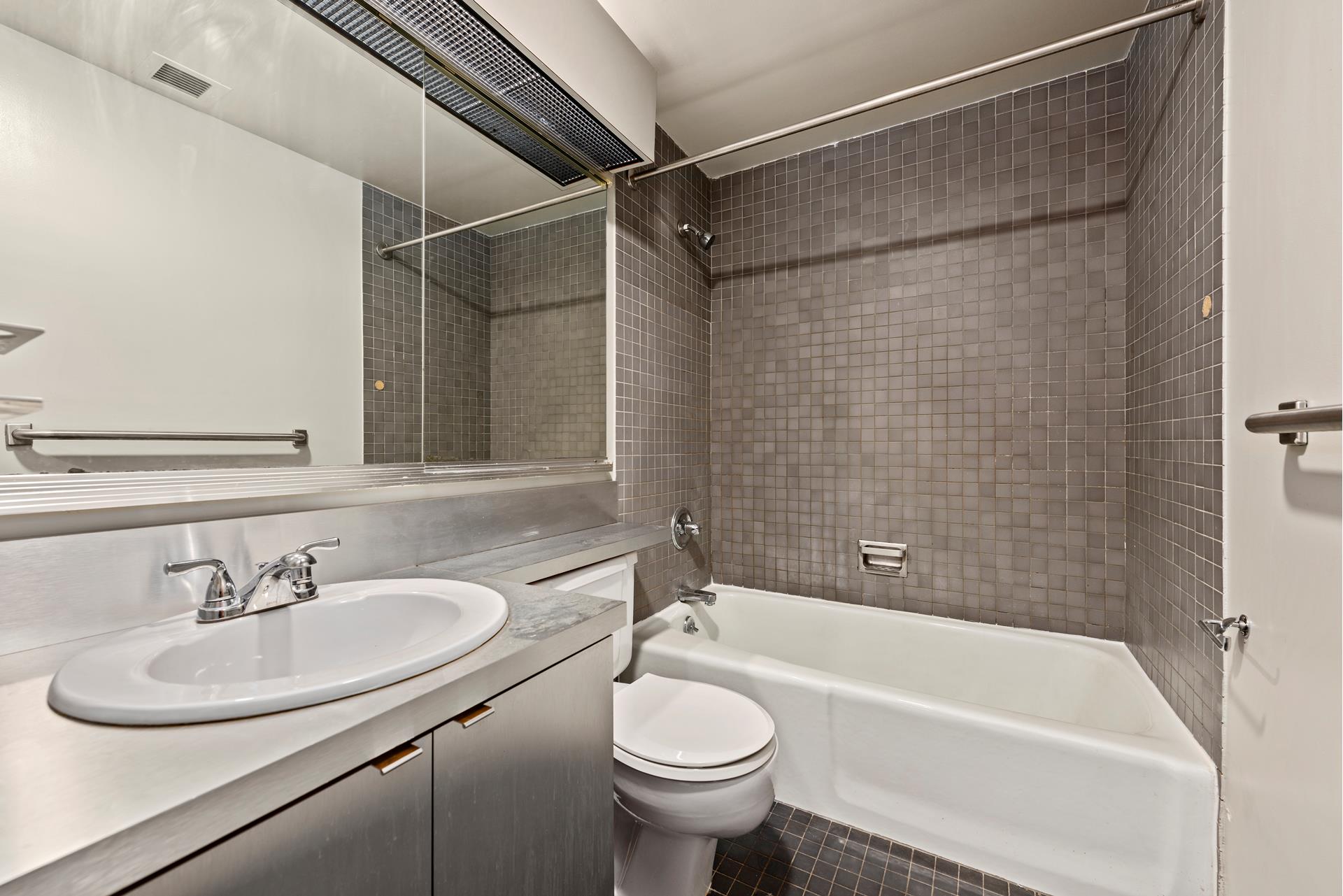 250 West 88th Street, Unit 508 Manhattan, NY 10024 - Photo 6 of 9 a bathroom with a sink and a toilet