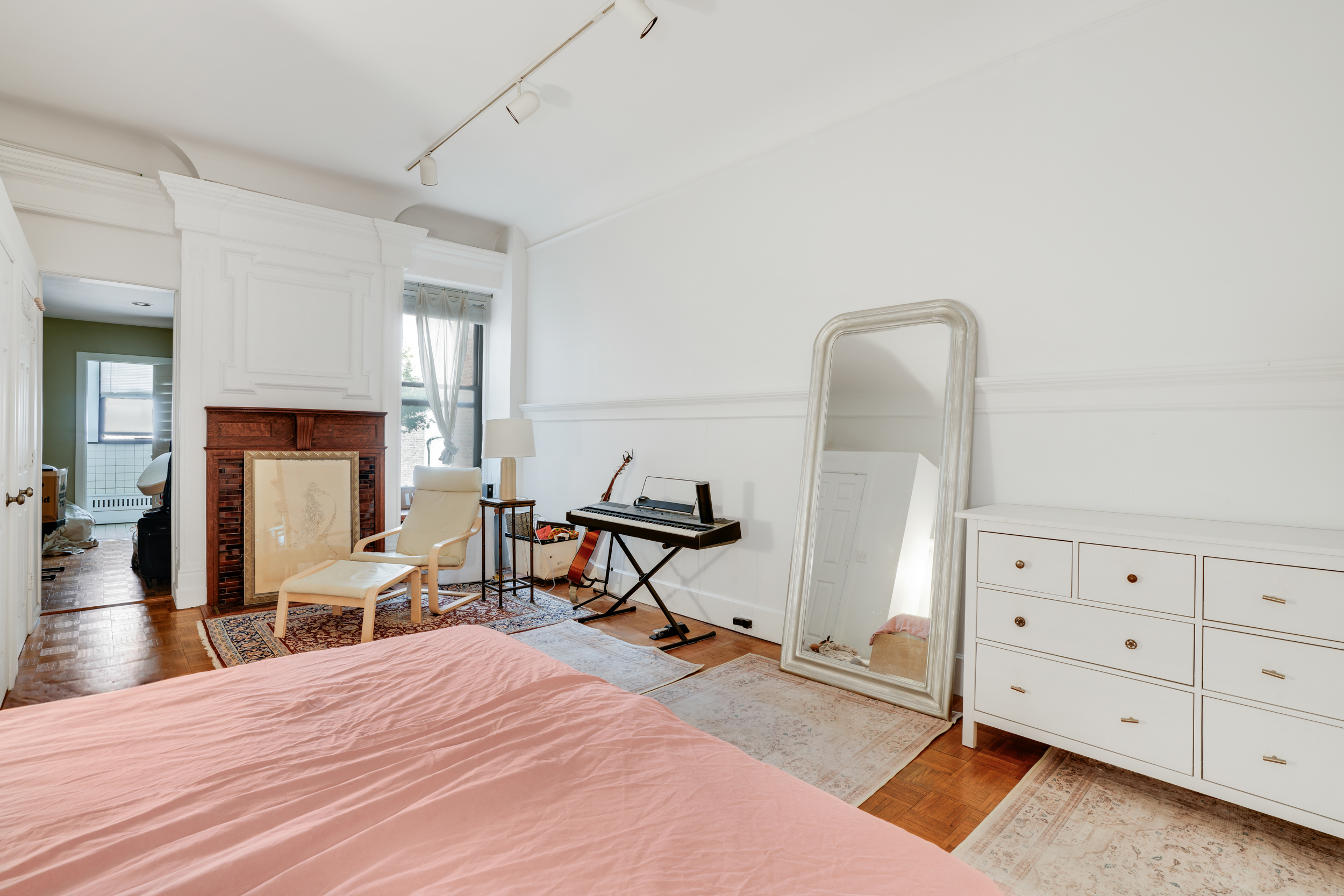 337 West 71st Street, Unit 3 Manhattan, NY 10023 - Photo 7 of 9 a bedroom with furniture and a dresser
