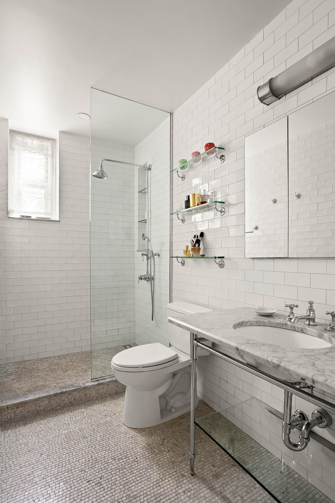 37-28 80th Street, Unit 32 Queens, NY 11372 - Photo 6 of 13 a bathroom with a sink toilet and shower
