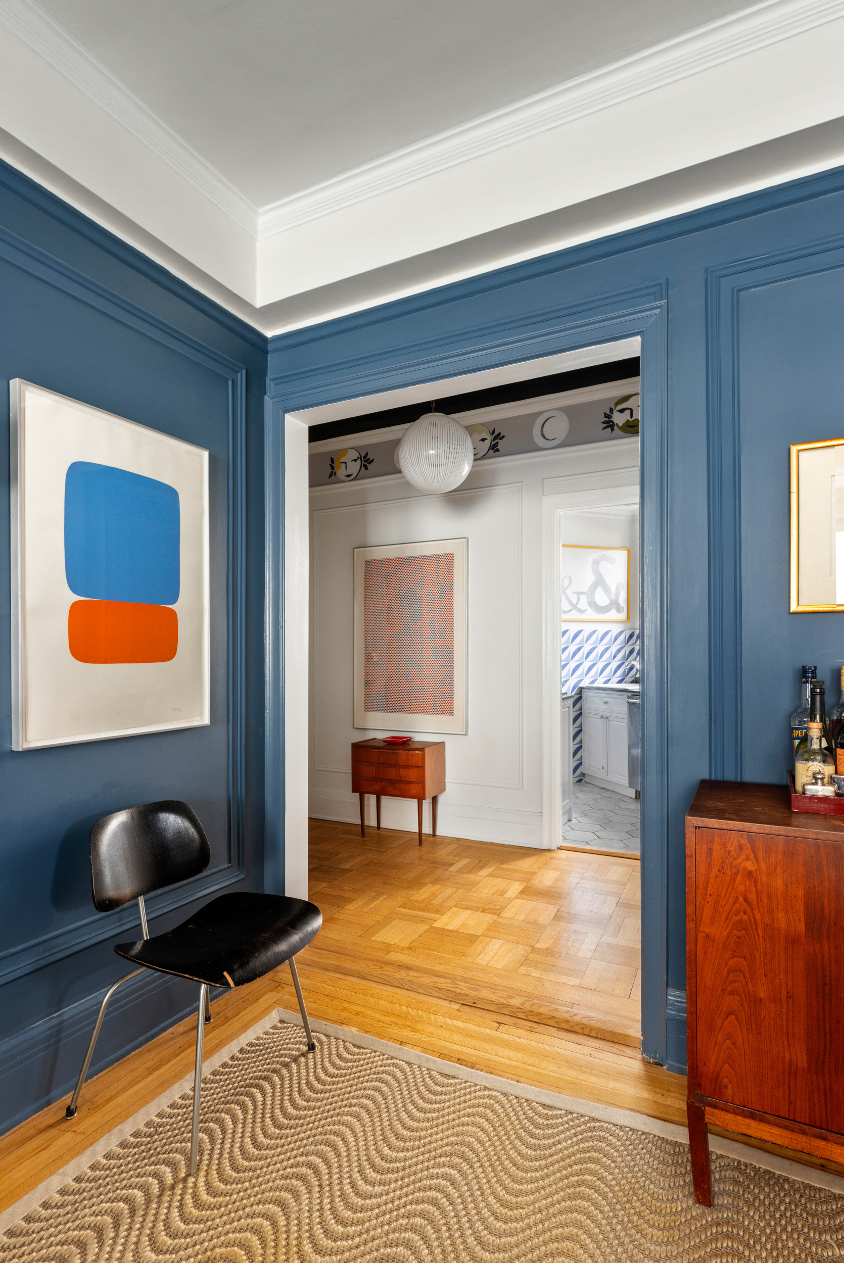 38 East 85th Street, Unit 10E Manhattan, NY 10028 - Photo 3 of 14 a living room with furniture and a table