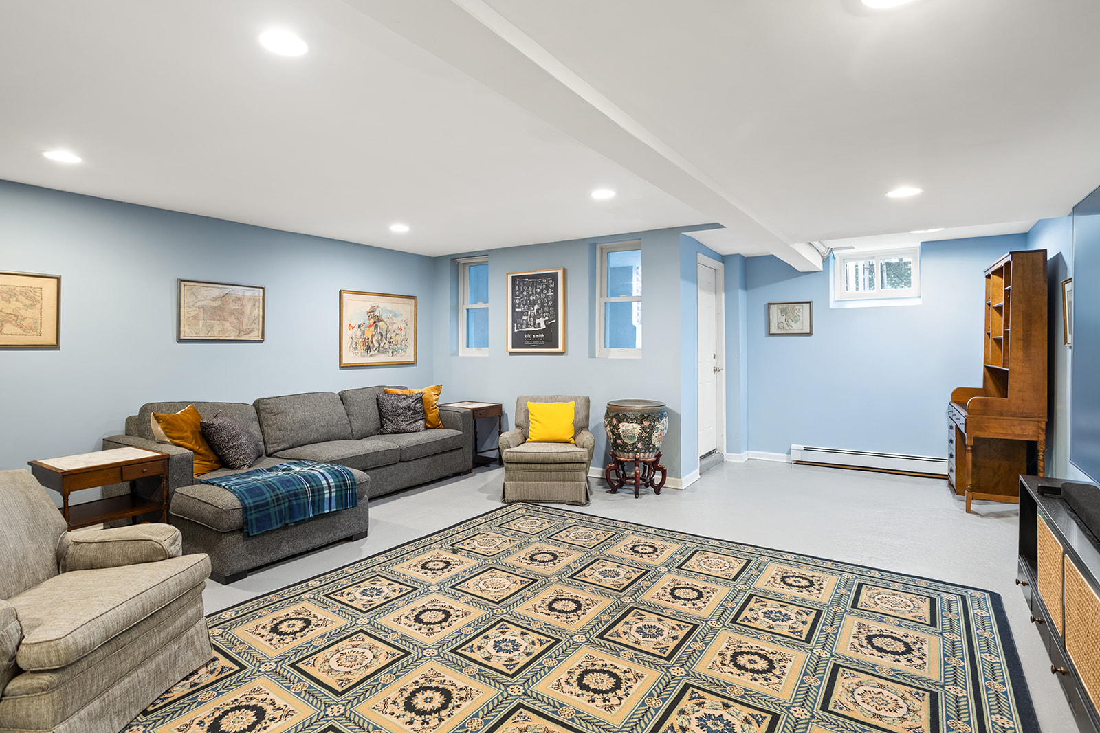 30-22 88th Street Queens, NY 11369 - Photo 10 of 14 a living room with furniture and a flat screen tv