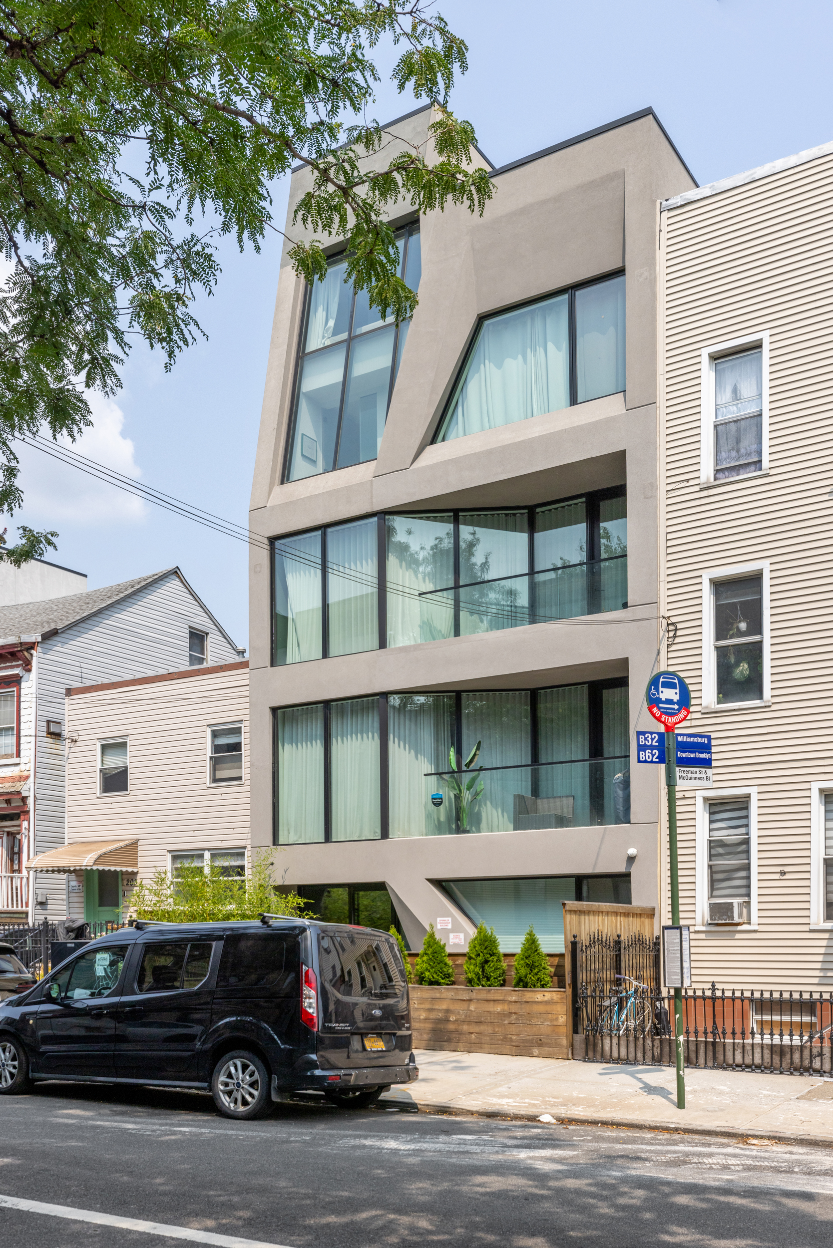 205 Freeman Street, Unit 3 Brooklyn, NY 11222 - Photo 8 of 9 a car parked in front of a building