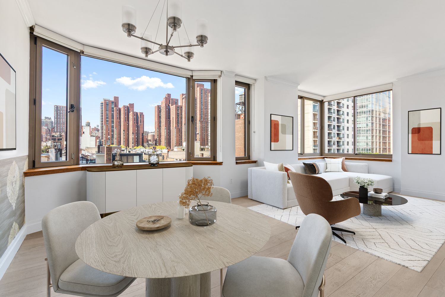 400 East 90th Street, Unit 7D Manhattan, NY 10128 - Photo 2 of 8 a living room with furniture and a large window