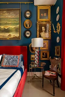 a bedroom with a bed and dresser