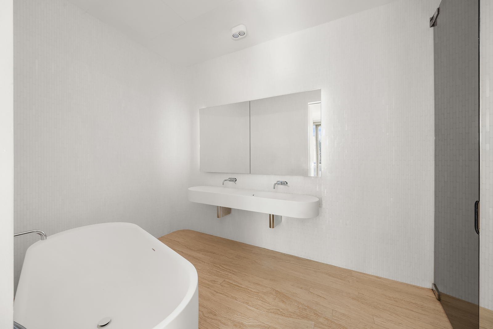 56 Leonard Street, Unit 39BEAST Manhattan, NY 10013 - Photo 12 of 18 a bathroom with a sink and mirror