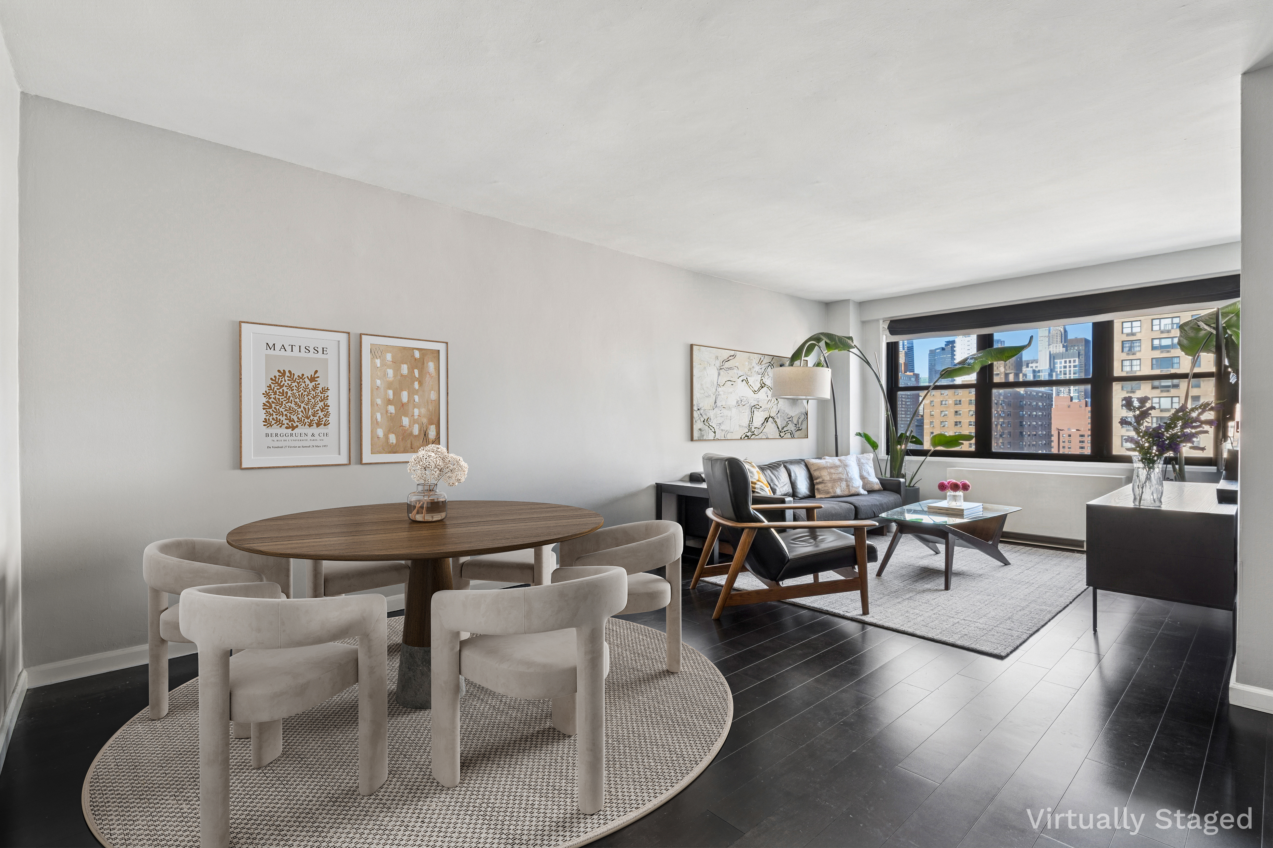 245 East 25th Street, Unit 19L Manhattan, NY 10010 - Photo 2 of 13 a living room with furniture and a large window
