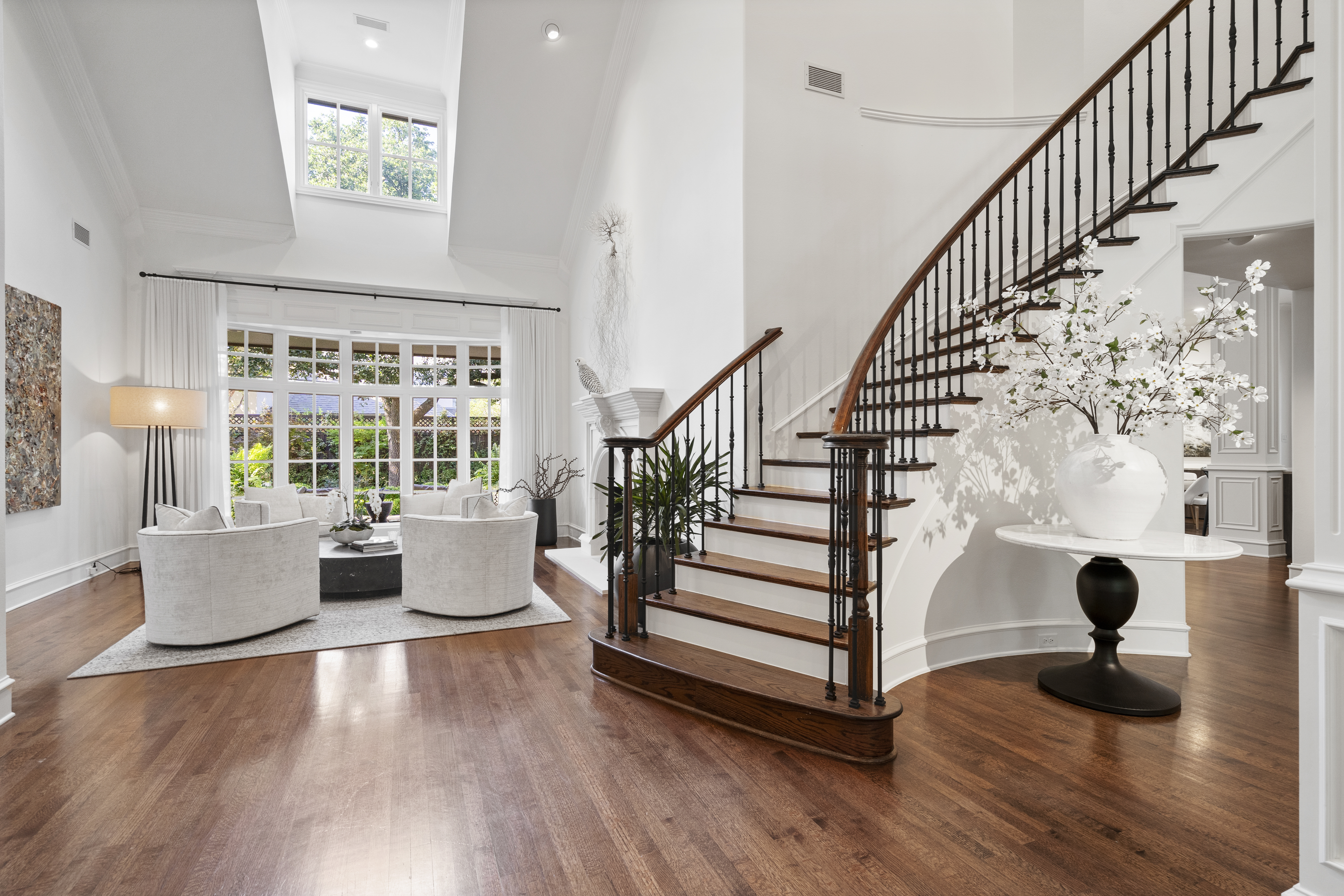 6607 Meadow Road Dallas, TX 75230 - Photo 5 of 32 a view of entryway and hall with wooden floor
