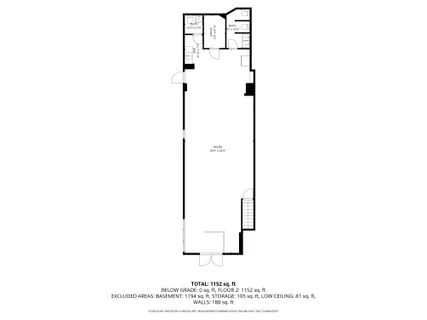 a picture of a bench in front of a wall