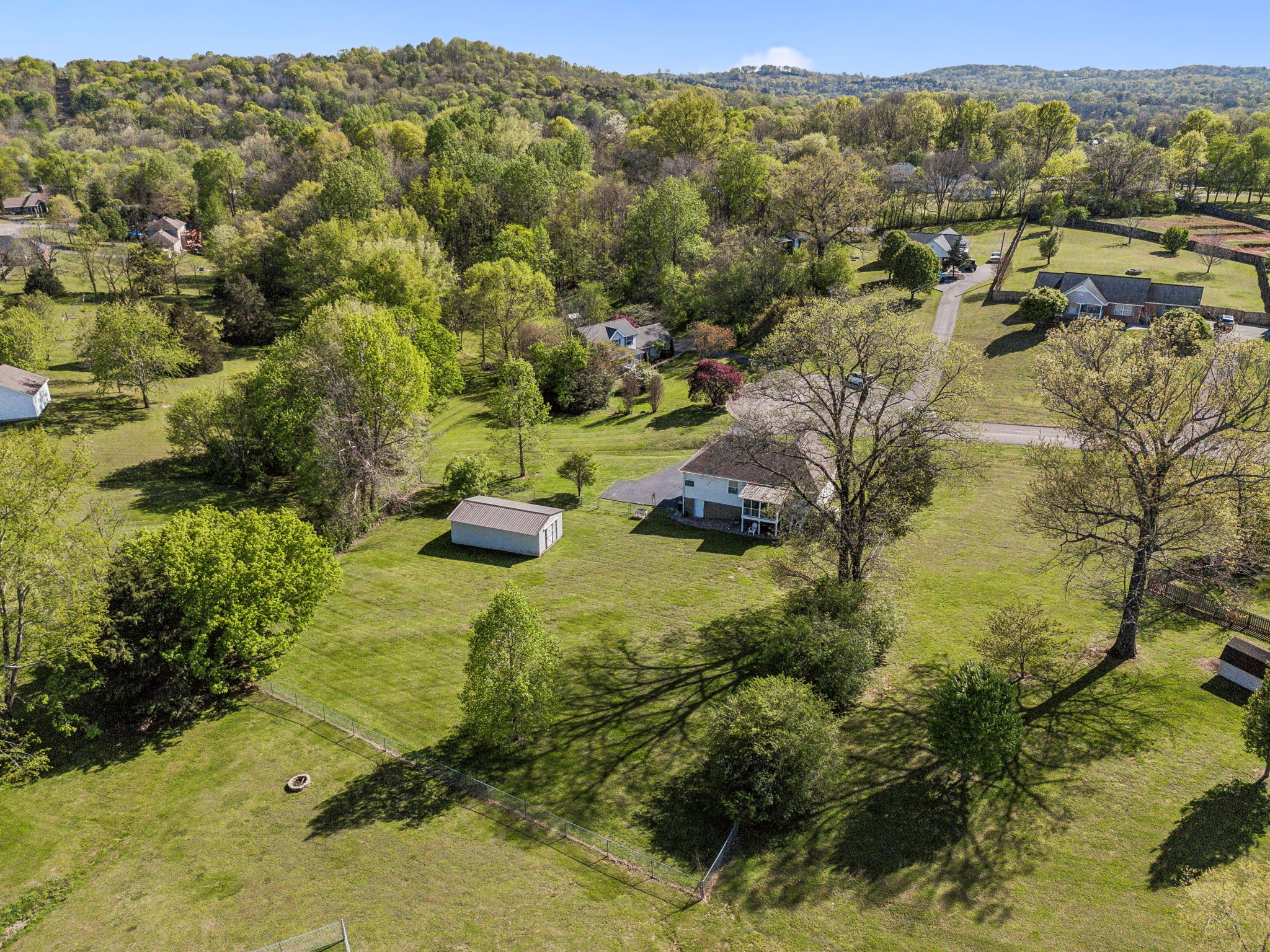 405 Billy Lane Spring Hill, TN 37174 - Photo 38 of 39 a view of a lake with mountains in the background