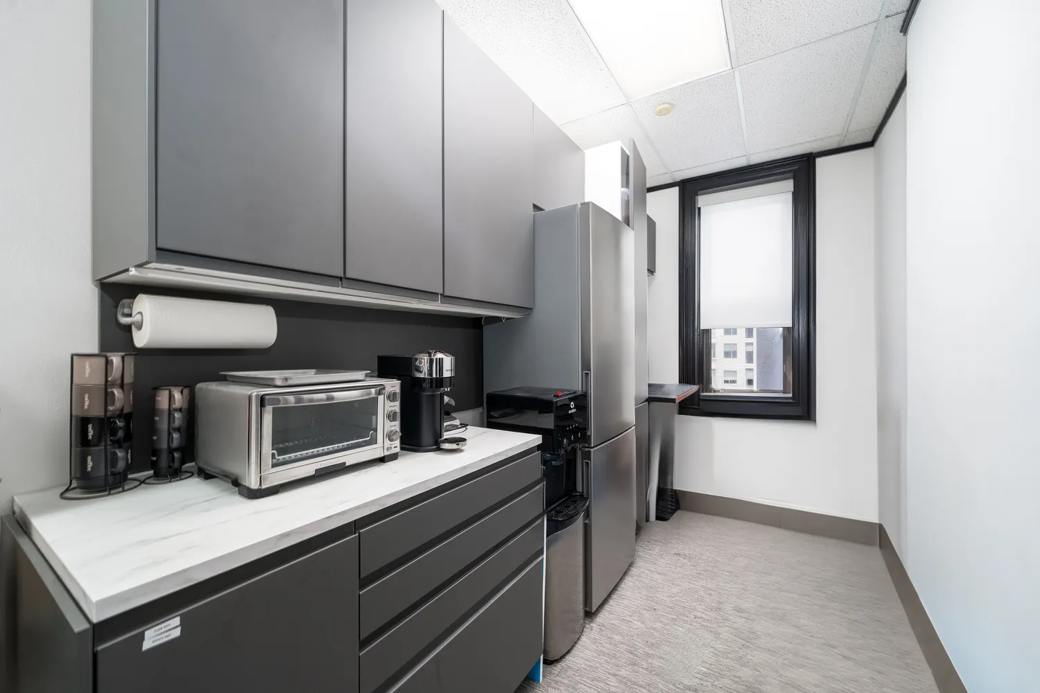 a kitchen with stainless steel appliances a refrigerator and stove