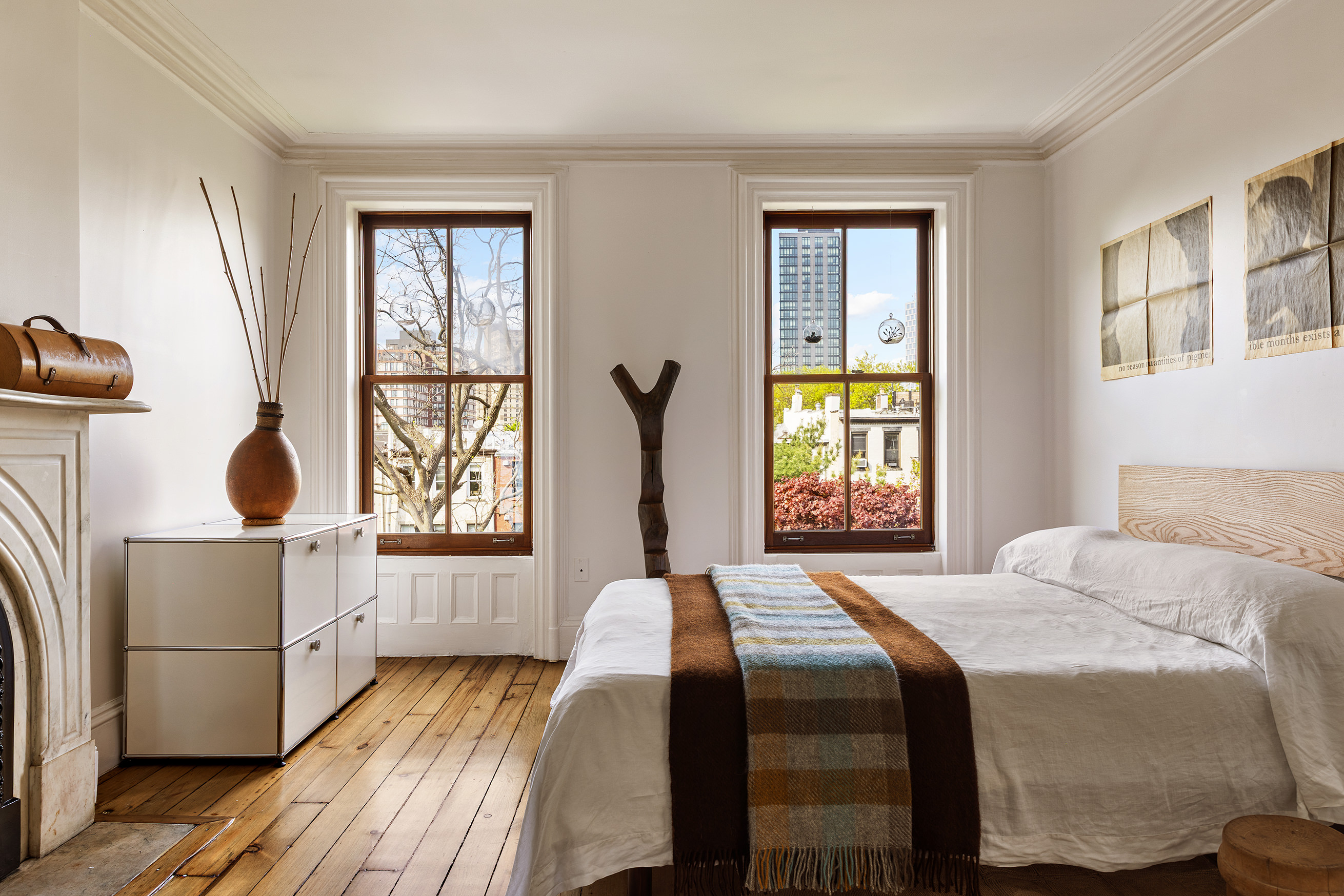 177 Prospect Place Brooklyn, NY 11238 - Photo 31 of 42 a bedroom with a bed and a window