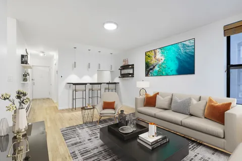 a living room with furniture and a couch