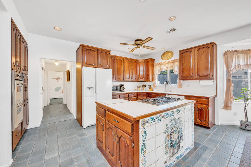35 Poe Street Staten Island, NY 10307 - Photo 14 of 36 a kitchen with a stove a refrigerator and a refrigerator