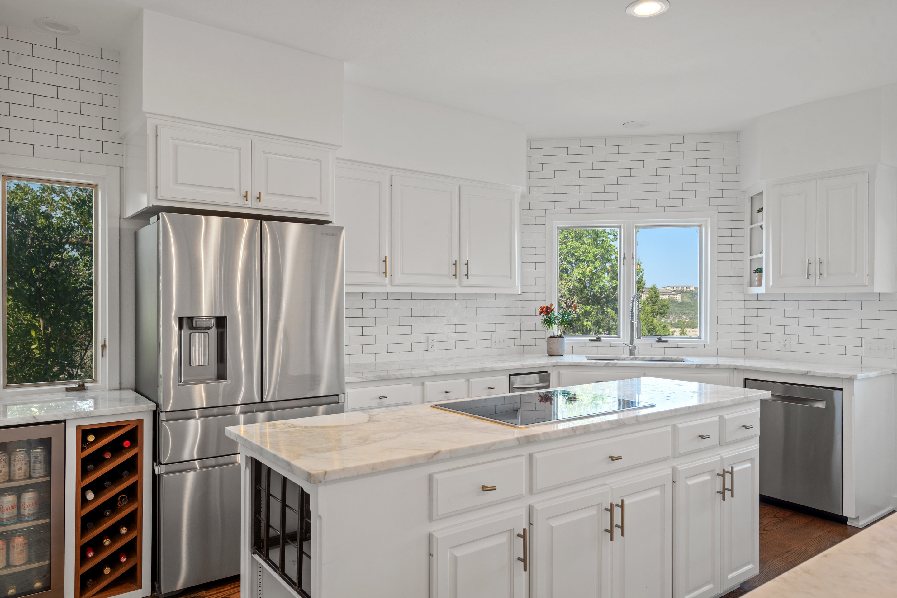 5319 Backtrail Drive Austin, TX 78731 - Photo 17 of 35 a kitchen with a sink stove and refrigerator