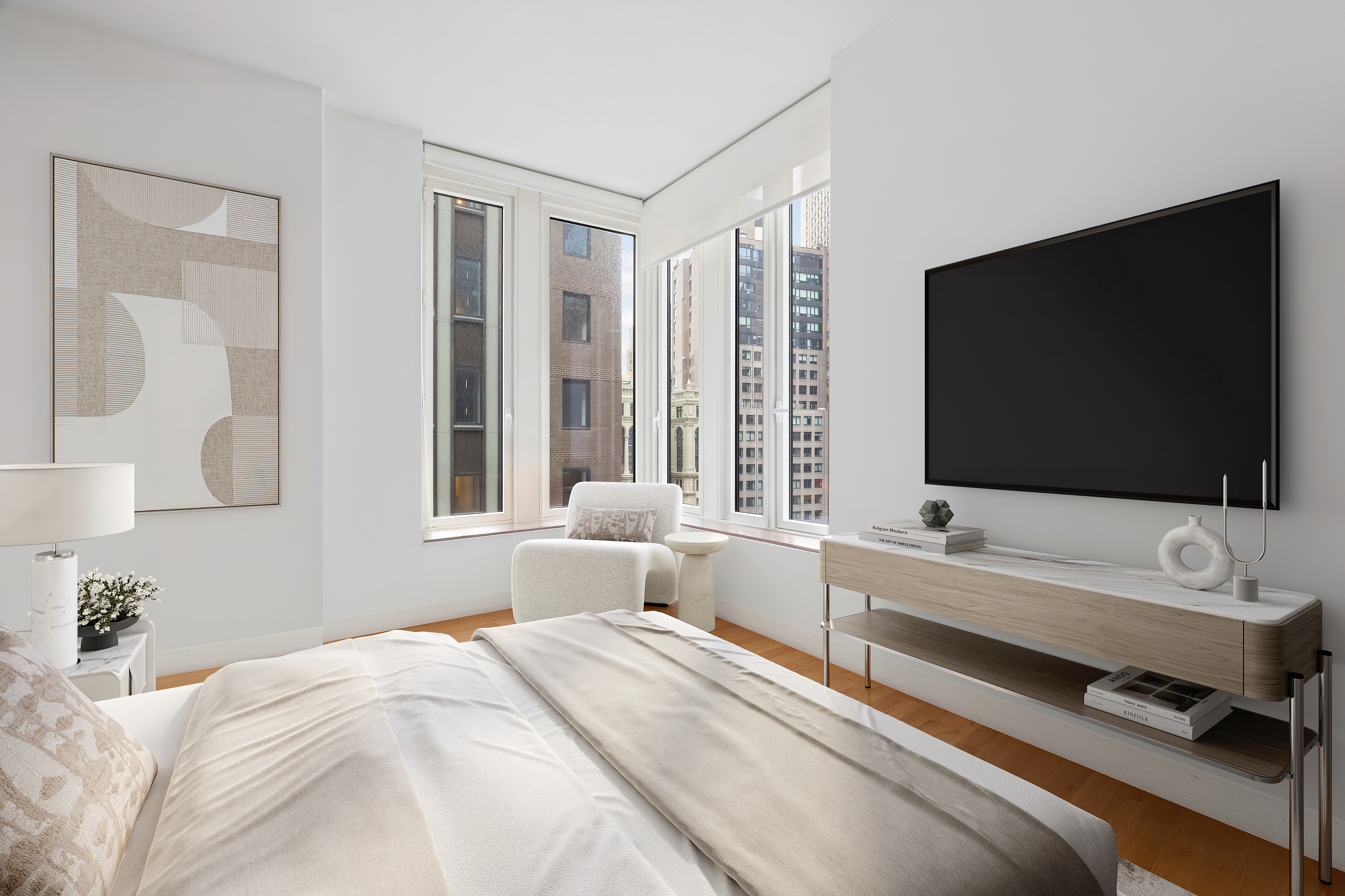 15 William Street, Unit 21A Manhattan, NY 10005 - Photo 7 of 19 a bedroom with a bed and a flat screen tv