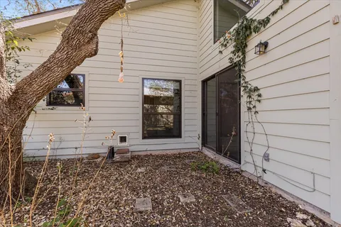 a wooden bench sitting in middle of a field