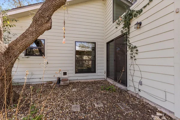 a wooden bench sitting in middle of a field
