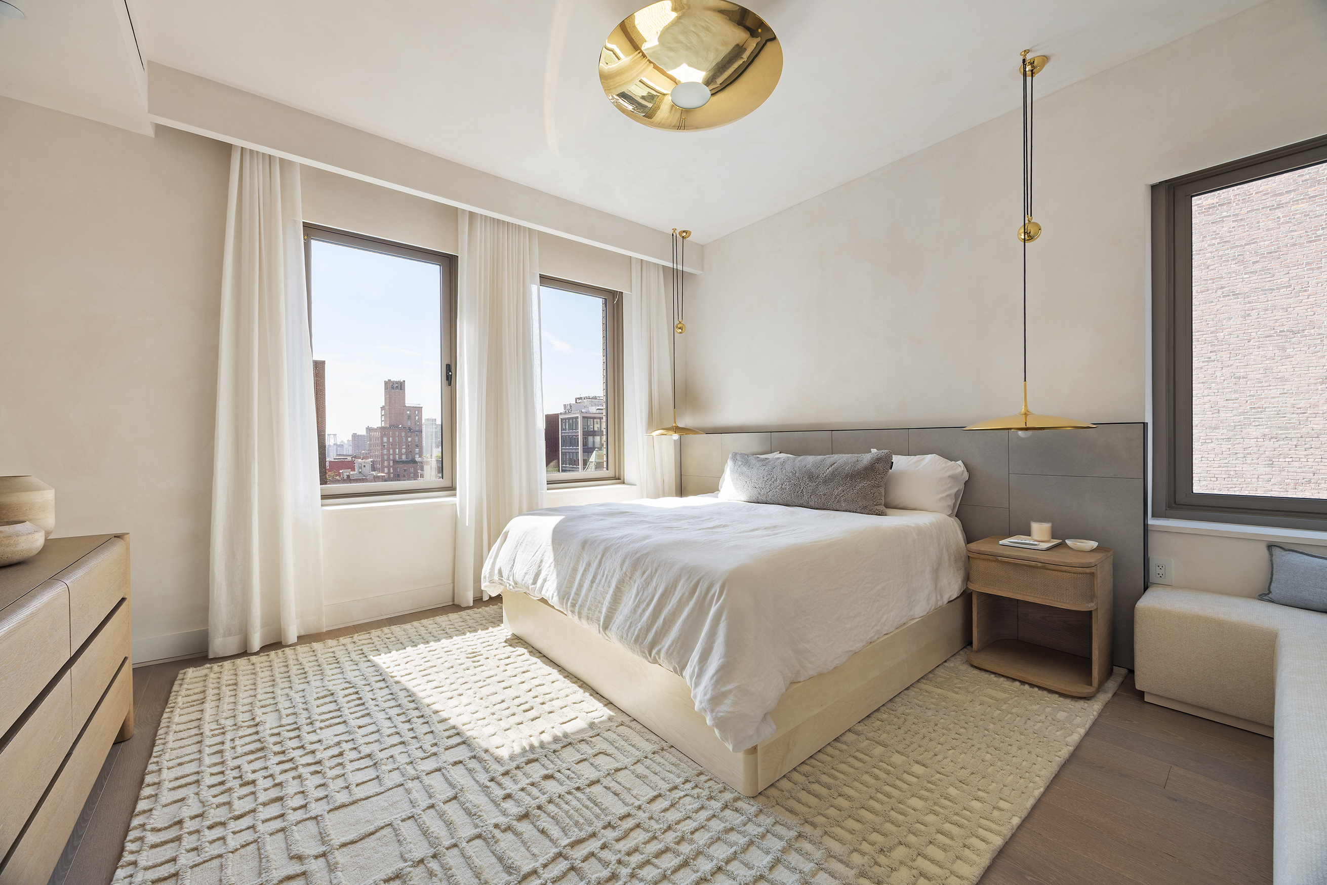 1 Great Jones Alley, Unit 10 Manhattan, NY 10012 - Photo 21 of 41 a bedroom with a bed and a window