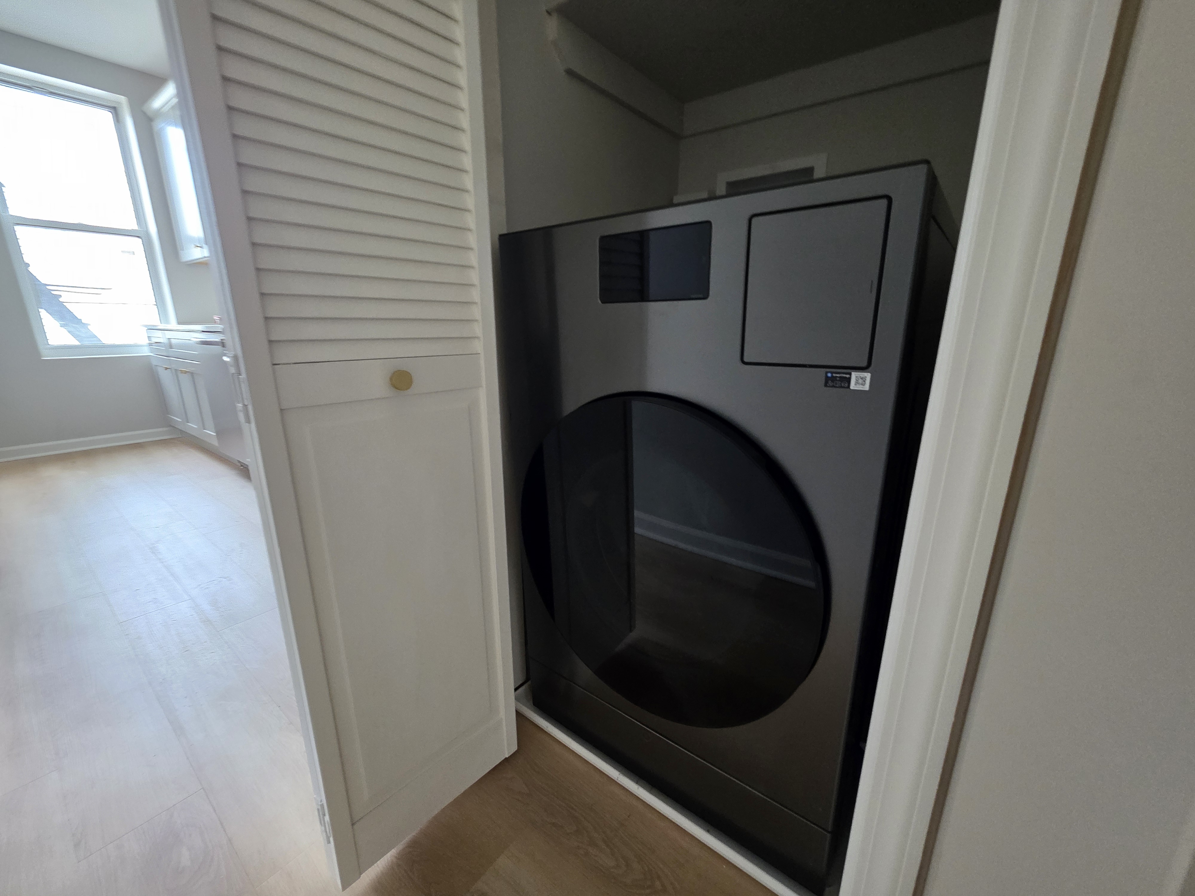 733 Metropolitan Avenue, Unit 3 Brooklyn, NY 11211 - Photo 13 of 13 a close up view of a washer and dryer