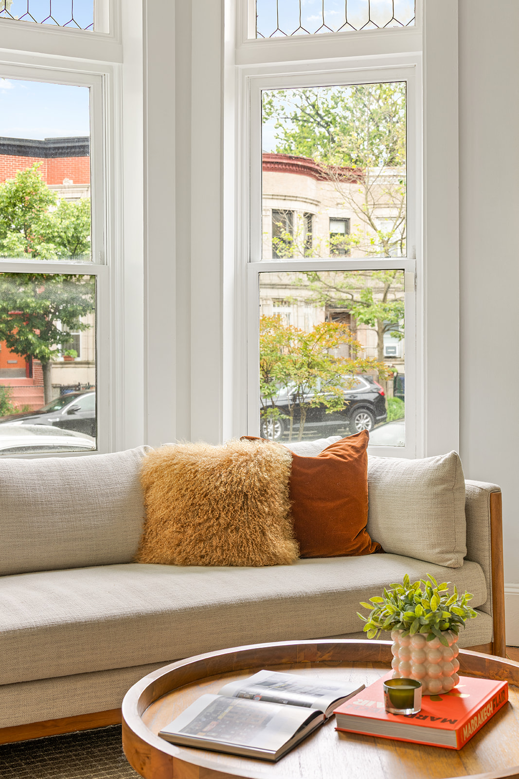 203 Lefferts Avenue Brooklyn, NY 11225 - Photo 4 of 12 a living room with furniture and a window