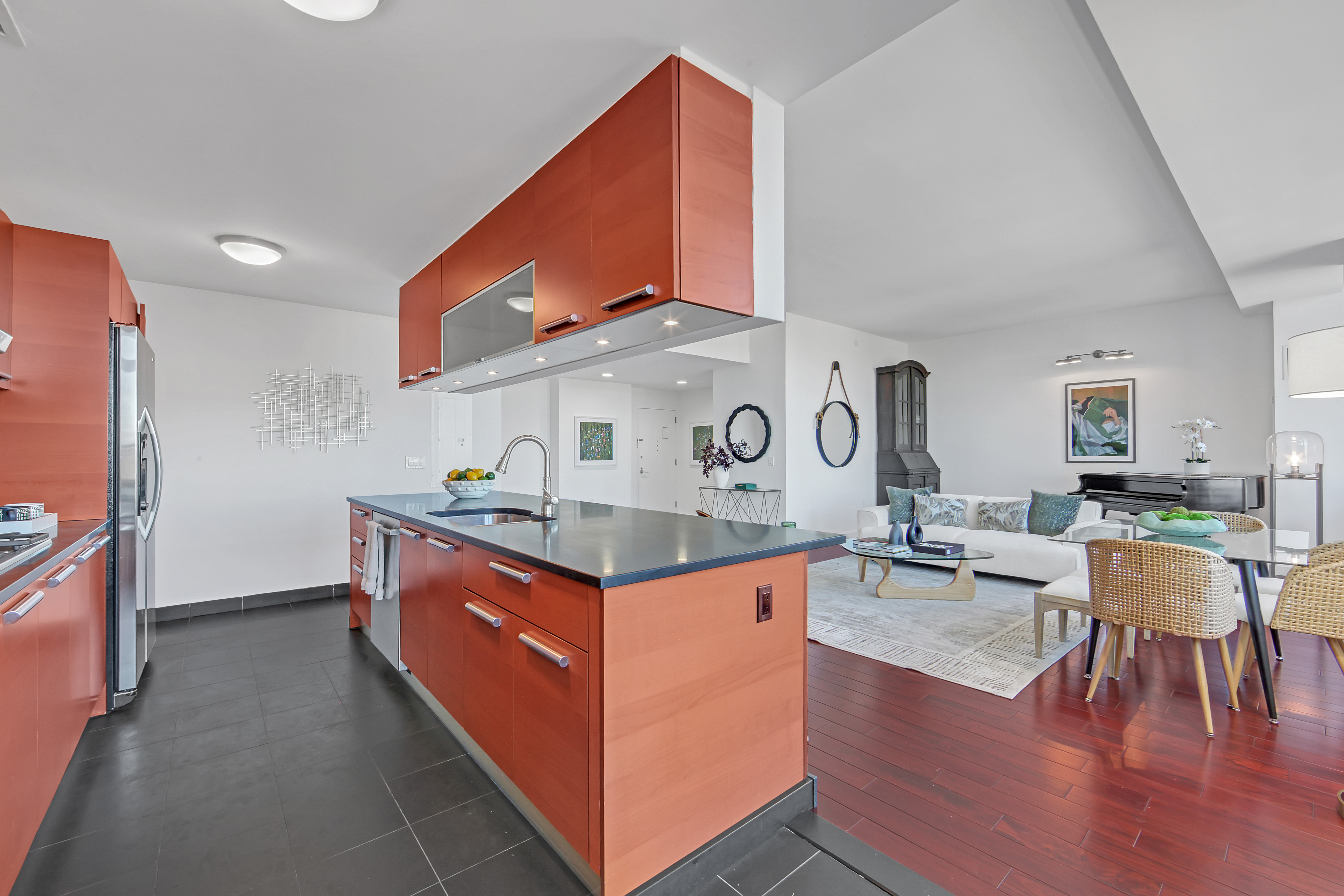 1485 5th Avenue, Unit 18/19H Manhattan, NY 10035 - Photo 8 of 24 a kitchen with a stove and cabinets