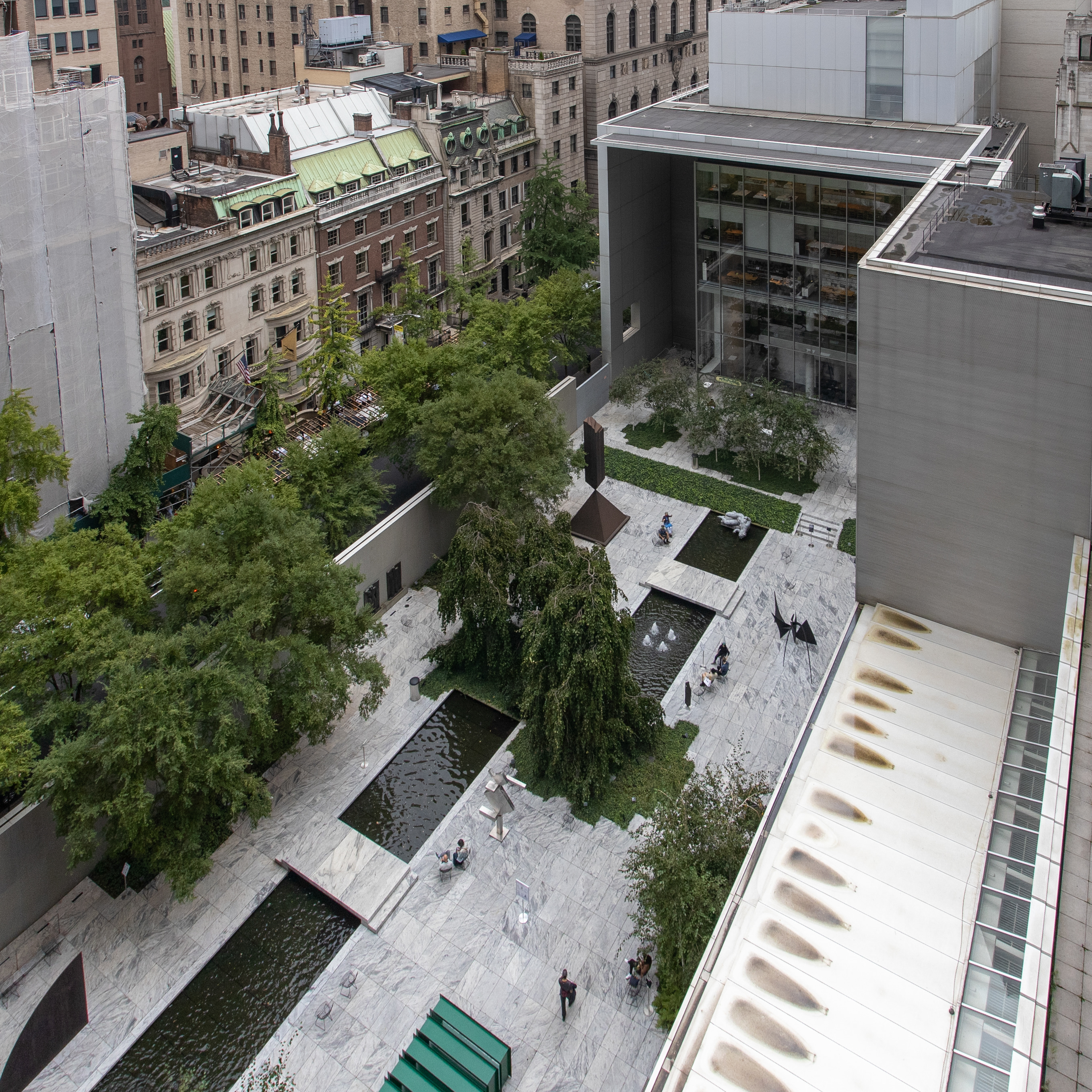 15 West 53rd Street, Unit 11H Manhattan, NY 10019 - Photo 10 of 11 an aerial view of multiple house