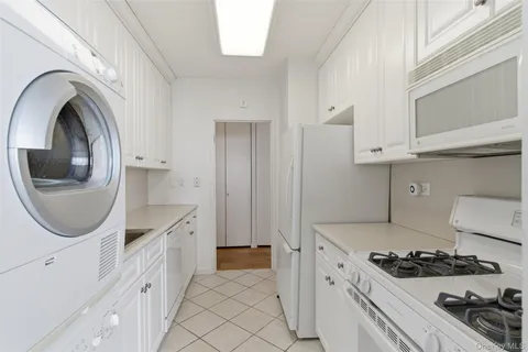 a kitchen with a stove and a sink