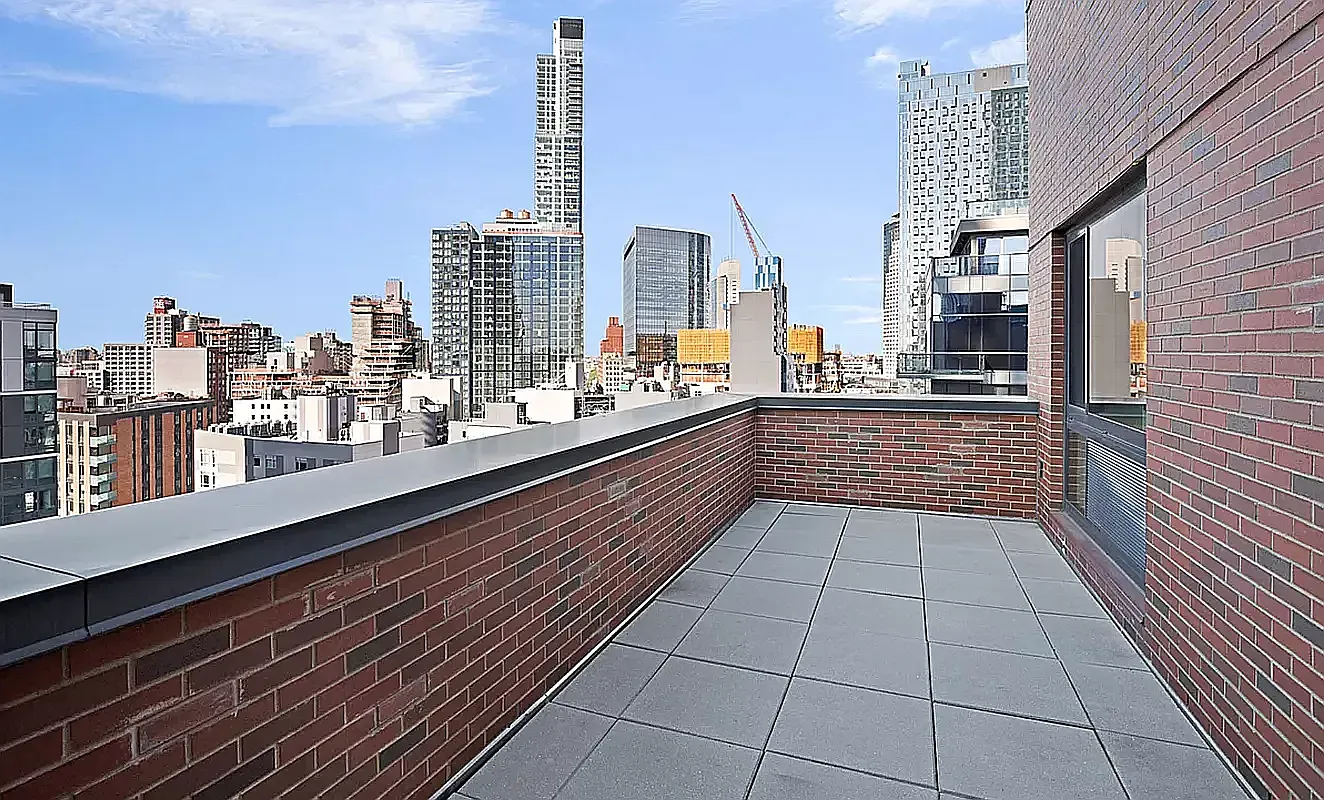 26-14 Jackson Avenue, Unit 9BB Queens, NY 11101 - Photo 5 of 8 a view of a balcony with city view