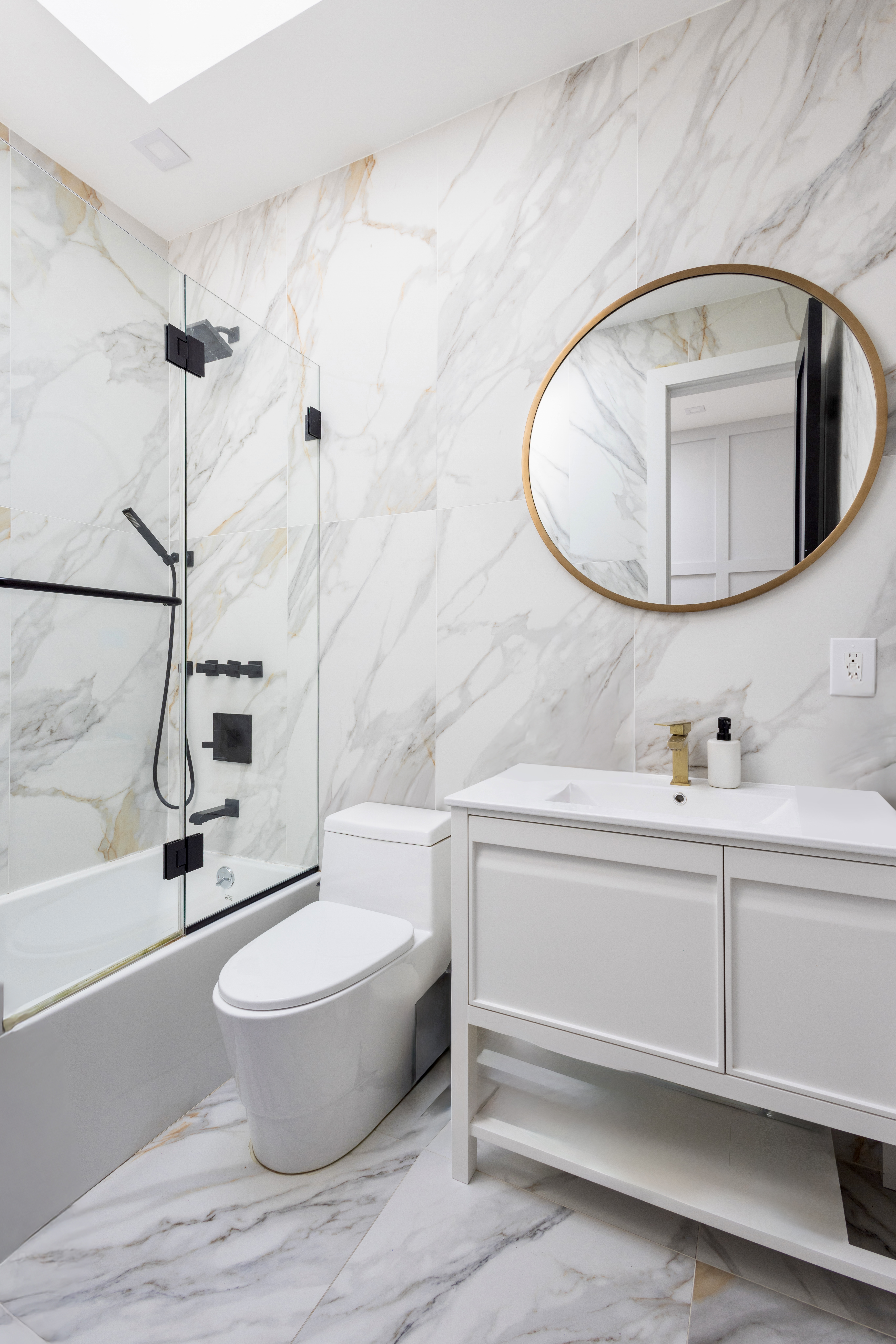 239 Winthrop Street Brooklyn, NY 11225 - Photo 17 of 20 a bathroom with a toilet and a sink