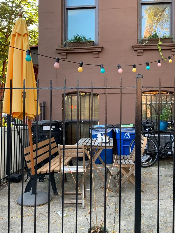 a view of a balcony with chairs