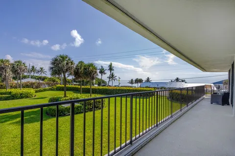 a view of a lounge chair in the front of a building