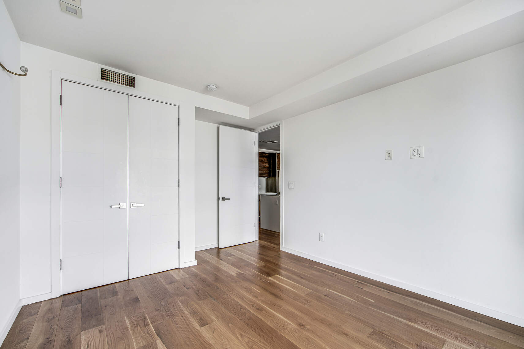 511 Lafayette Avenue, Unit 3B Brooklyn, NY 11205 - Photo 10 of 14 a view of an empty room and wooden floor