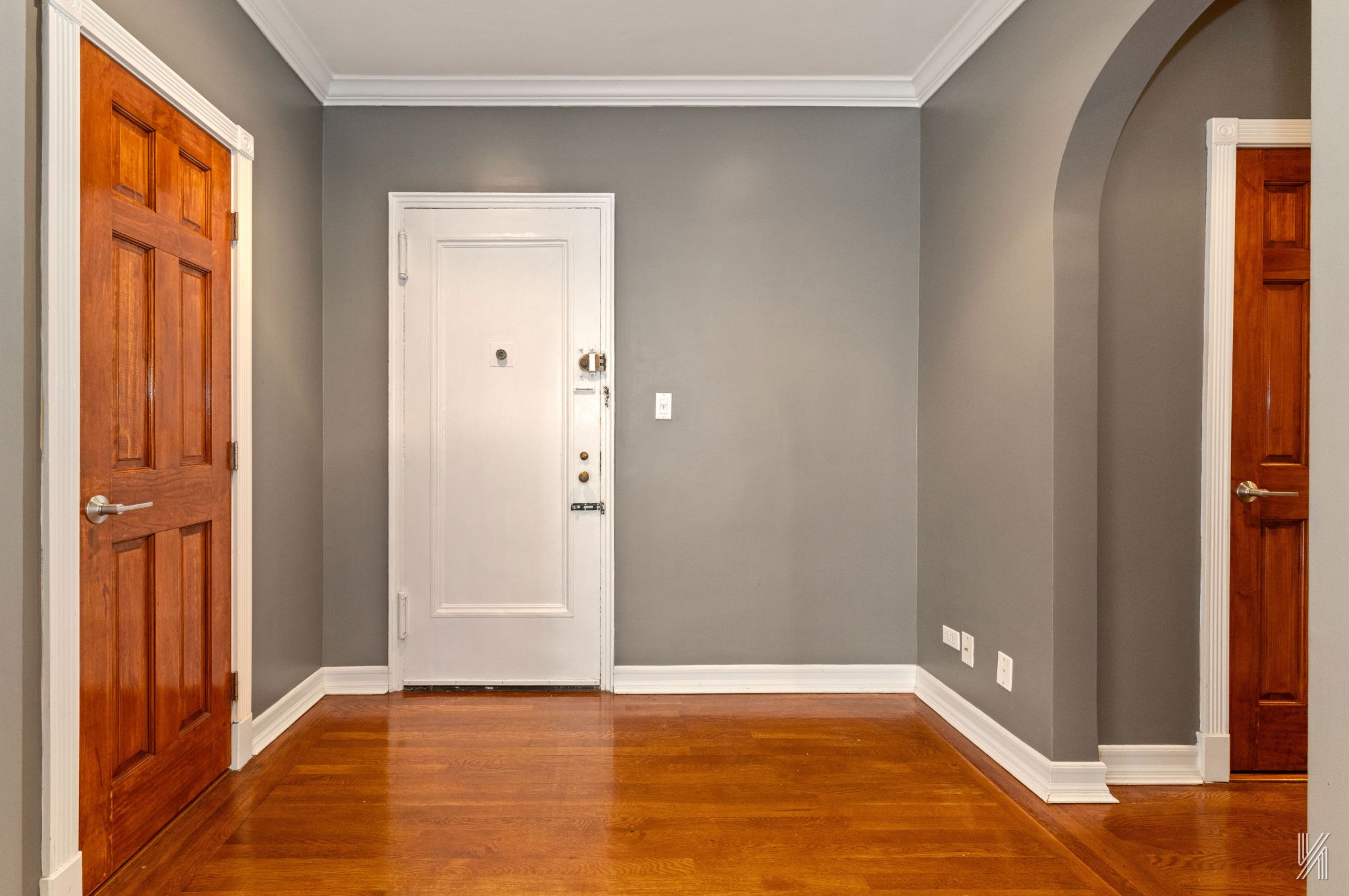 25-40 31st Avenue, Unit 6E Queens, NY 11106 - Photo 6 of 15 a view of an empty room with wooden floor