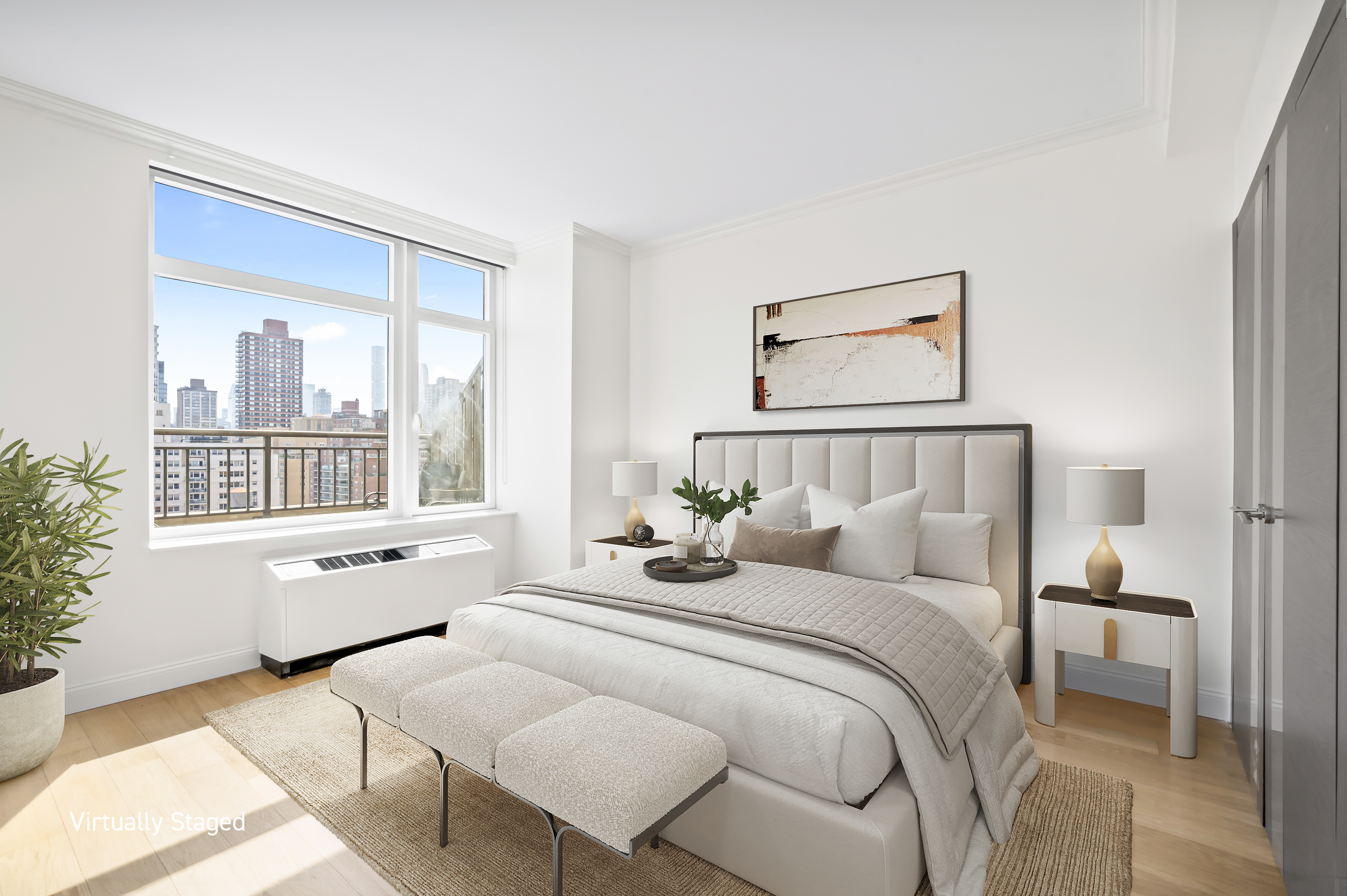 408 East 79th Street, Unit 16B Manhattan, NY 10075 - Photo 11 of 16 a bedroom with a bed and a large window