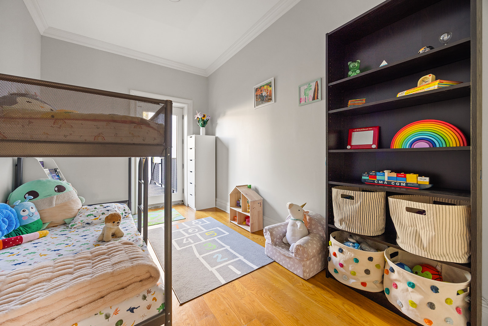493 18th Street, Unit 2 Brooklyn, NY 11215 - Photo 8 of 13 a bedroom with baby bed and window