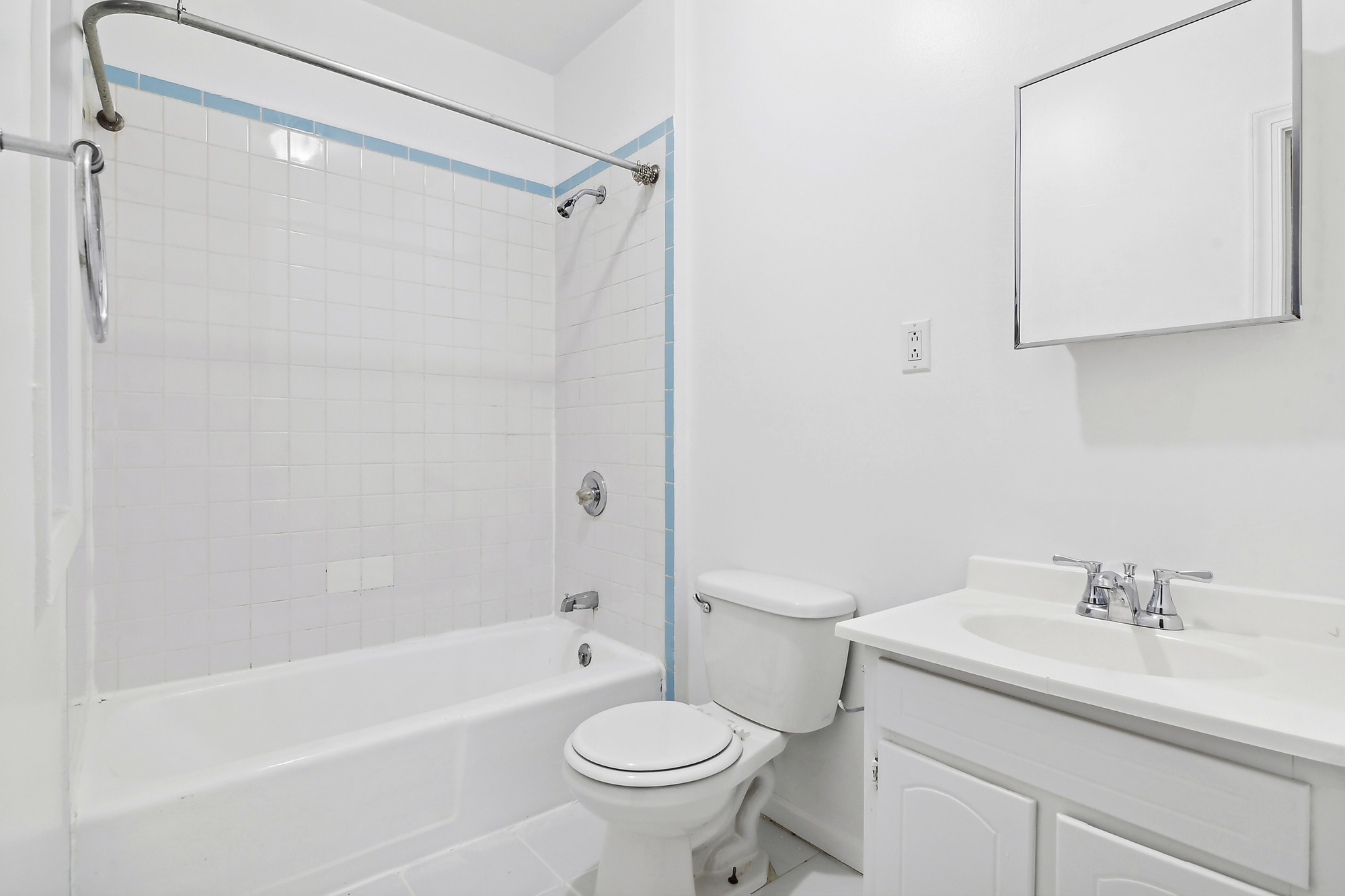 244 New York Avenue, Unit 3L Brooklyn, NY 11216 - Photo 6 of 7 a bathroom with a sink toilet and shower